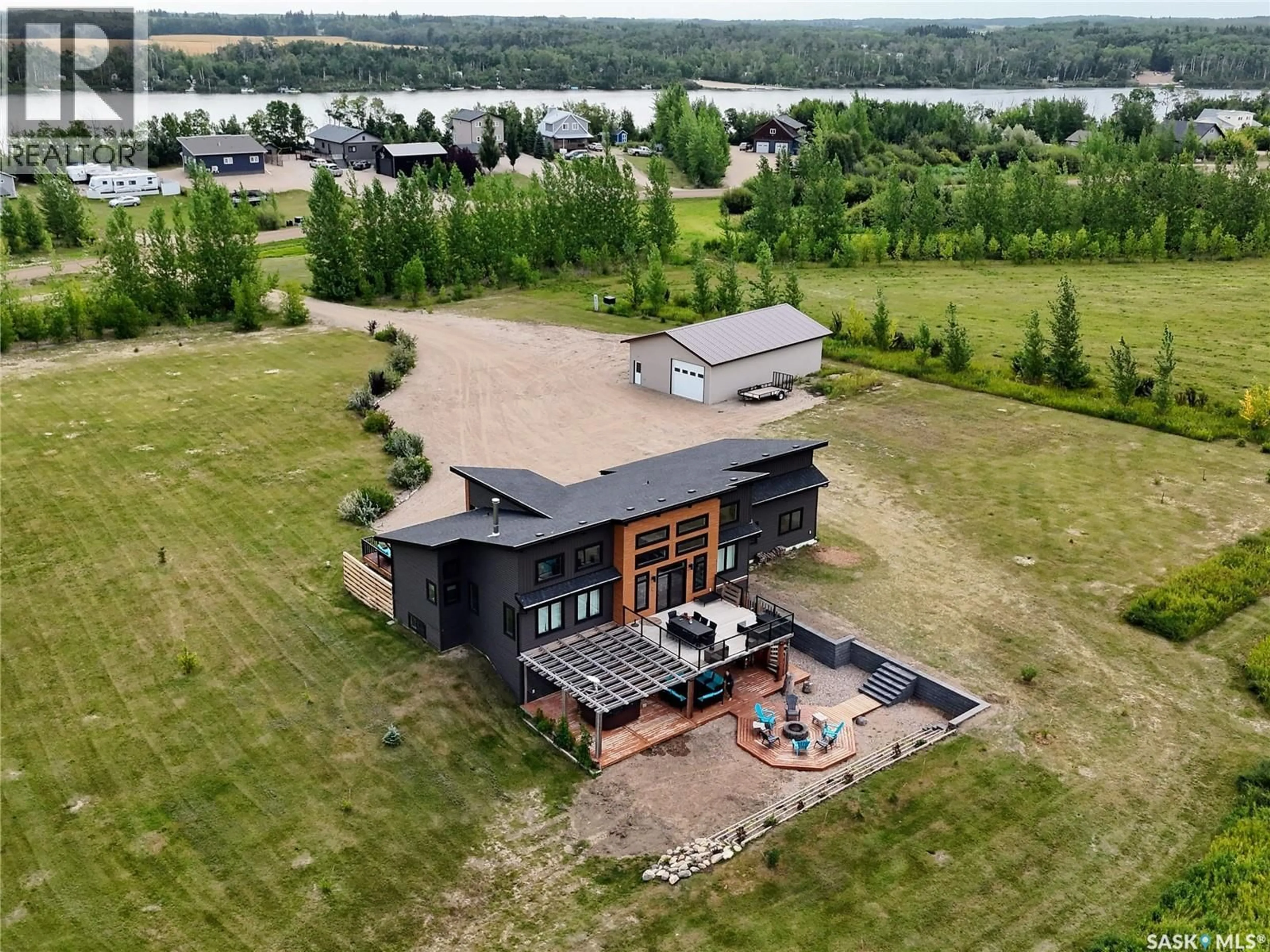 A pic from outside/outdoor area/front of a property/back of a property/a pic from drone, water/lake/river/ocean view for 162 LUCIEN LAKESHORE DRIVE, Lucien Lake Saskatchewan S0K2X0