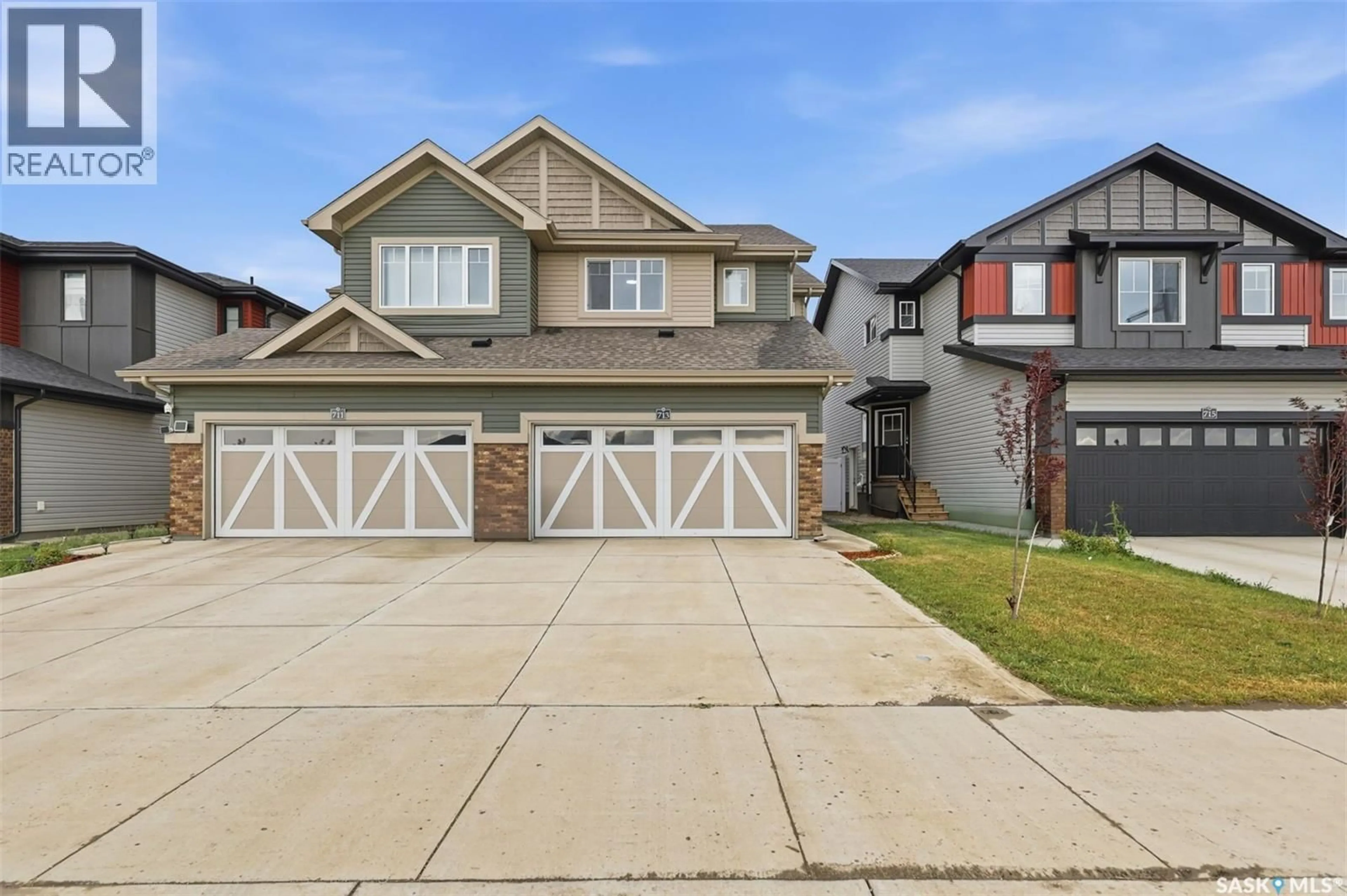 Home with vinyl exterior material, street for 713 BRIGHTON BOULEVARD, Saskatoon Saskatchewan S7V1P3