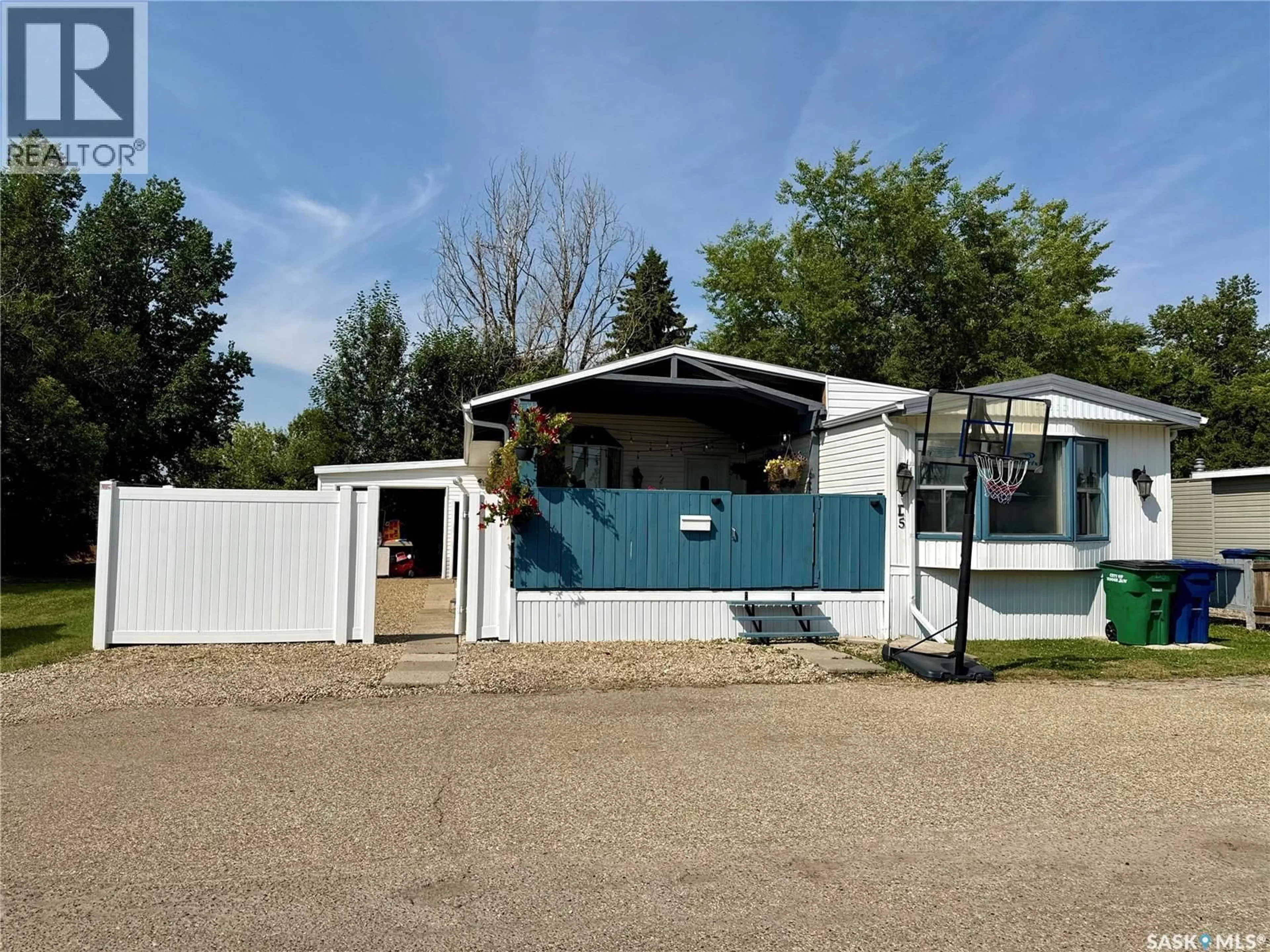 Home with vinyl exterior material, street for D5 - 1455 9TH AVENUE, Moose Jaw Saskatchewan S6J1C6