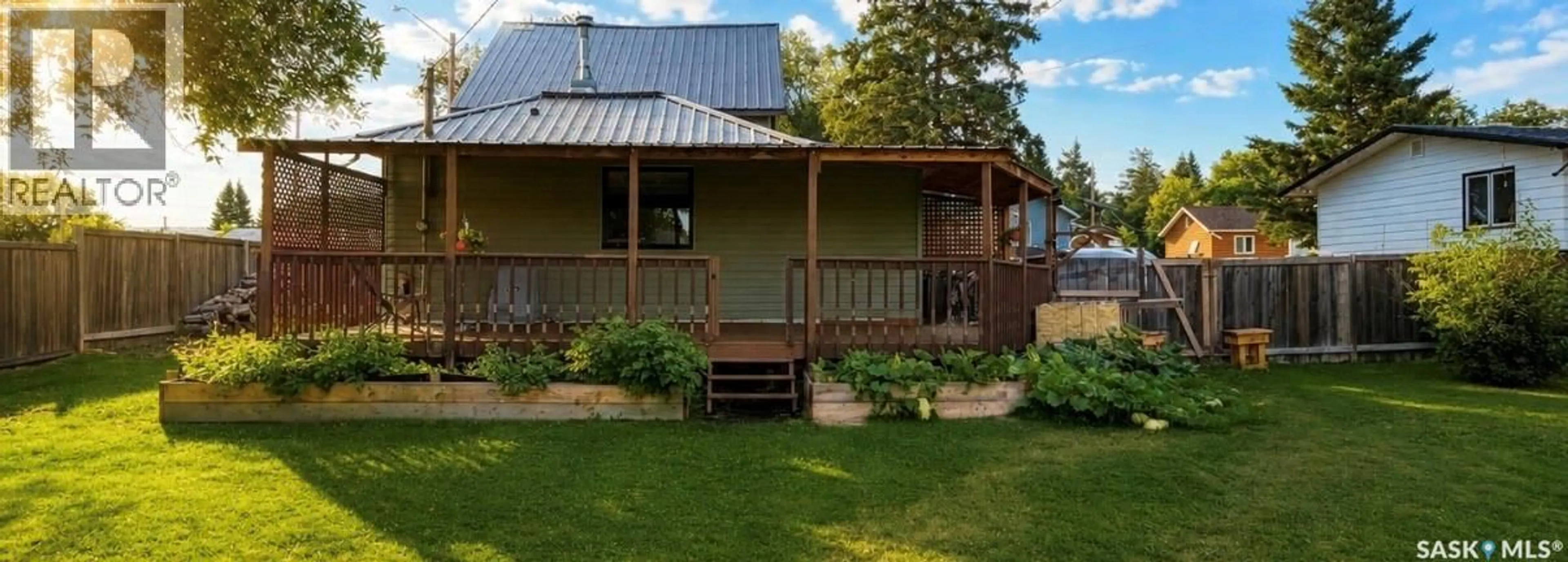 A pic from outside/outdoor area/front of a property/back of a property/a pic from drone, unknown for 116 5TH AVENUE, Big River Saskatchewan S0J0E0