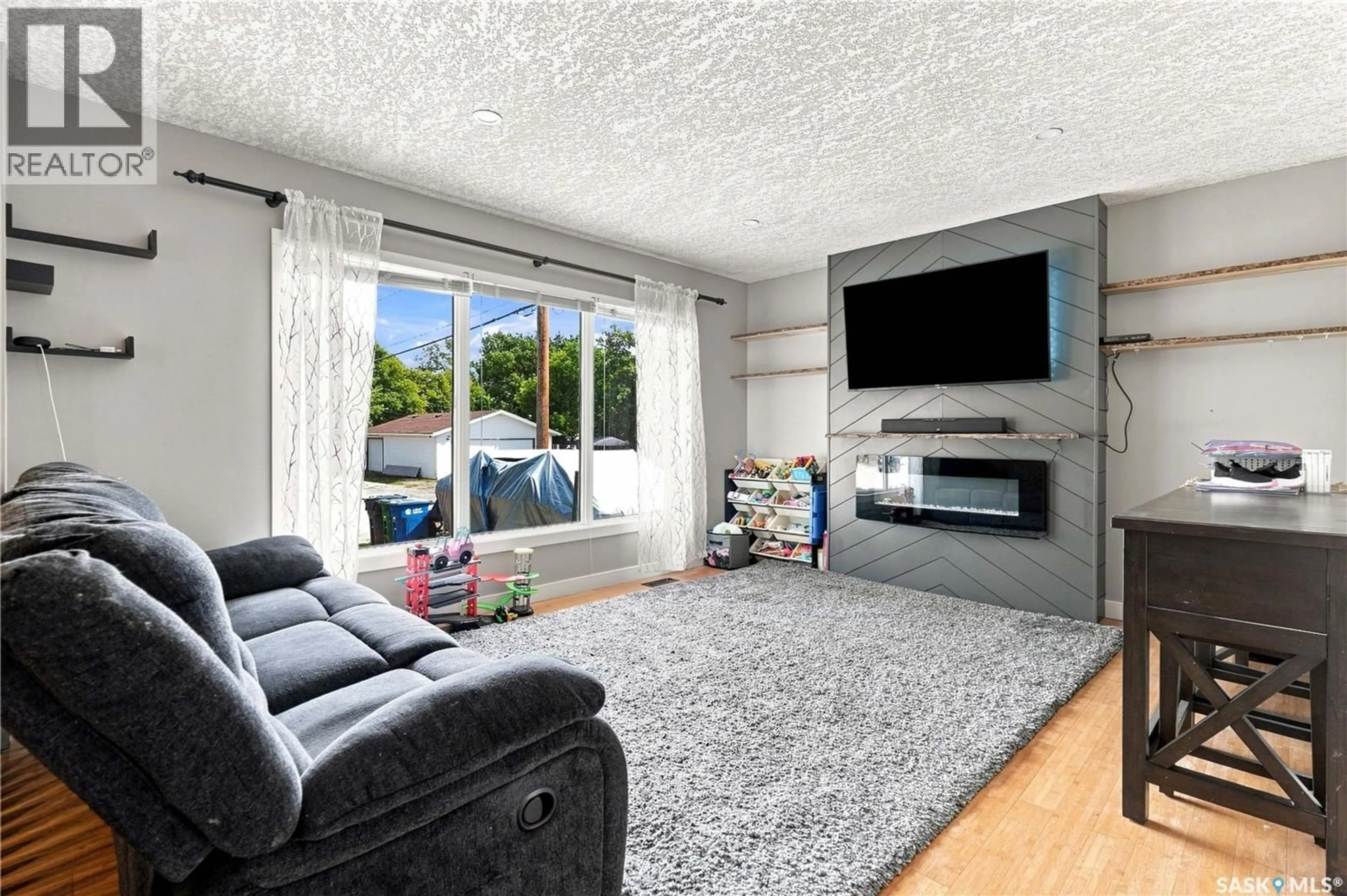 Living room with furniture, unknown for 130 6TH STREET, Pilot Butte Saskatchewan S0G3Z0
