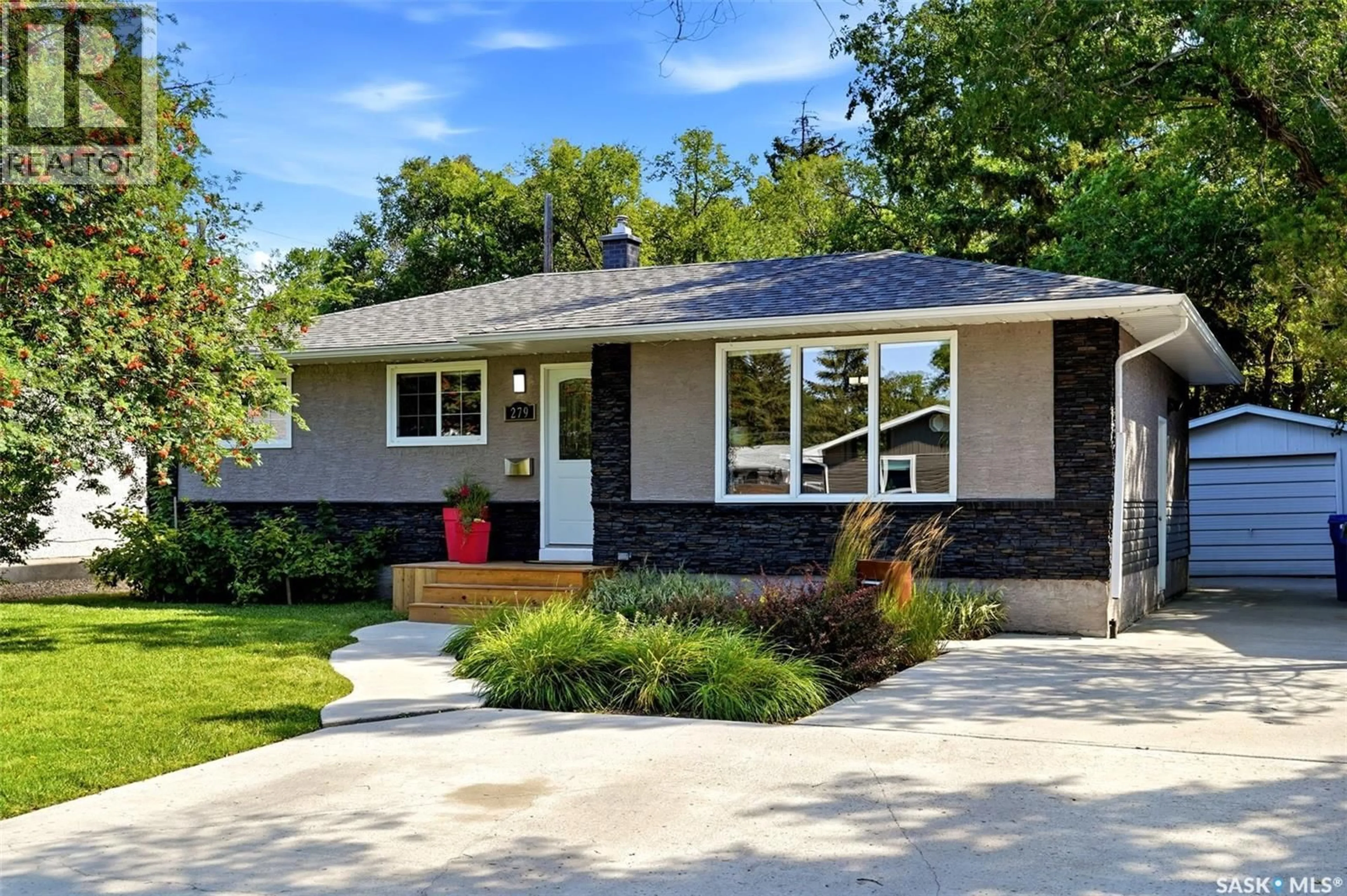 Home with brick exterior material, street for 279 LOGAN CRESCENT, Regina Saskatchewan S4S5S8