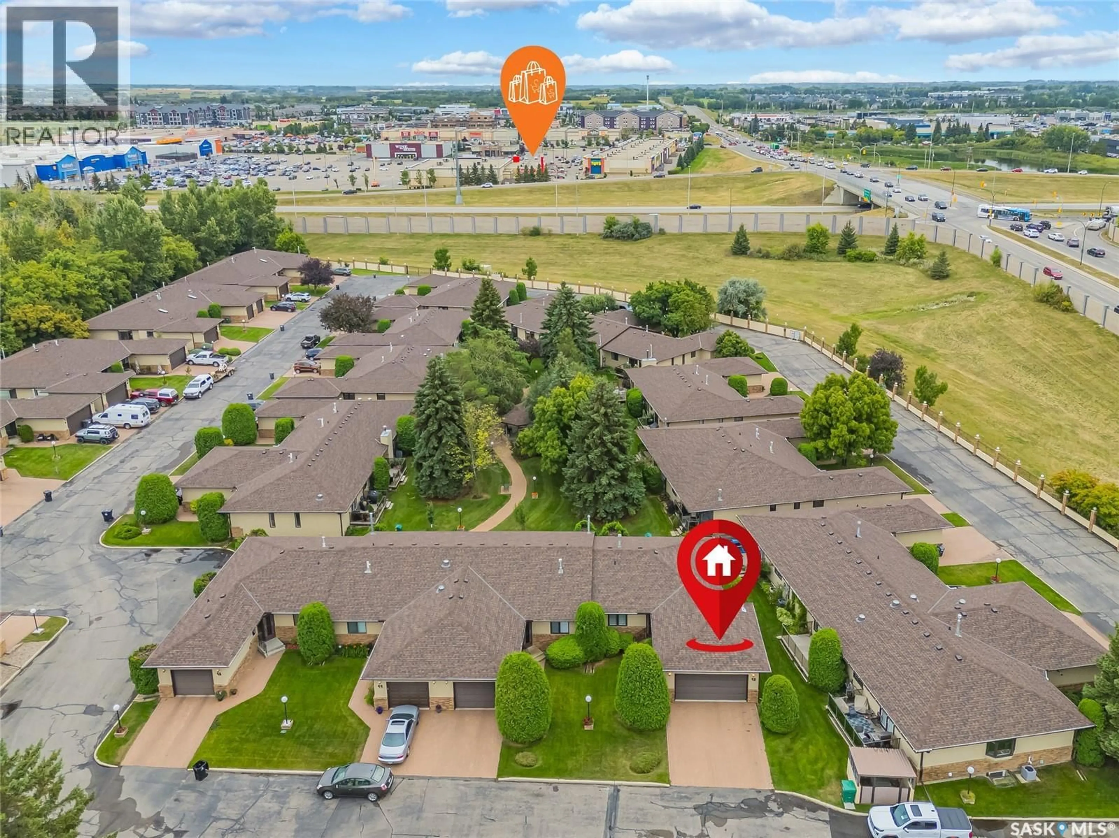 A pic from outside/outdoor area/front of a property/back of a property/a pic from drone, unknown for 42 - 3425 CALDER CRESCENT, Saskatoon Saskatchewan S7J4Z9