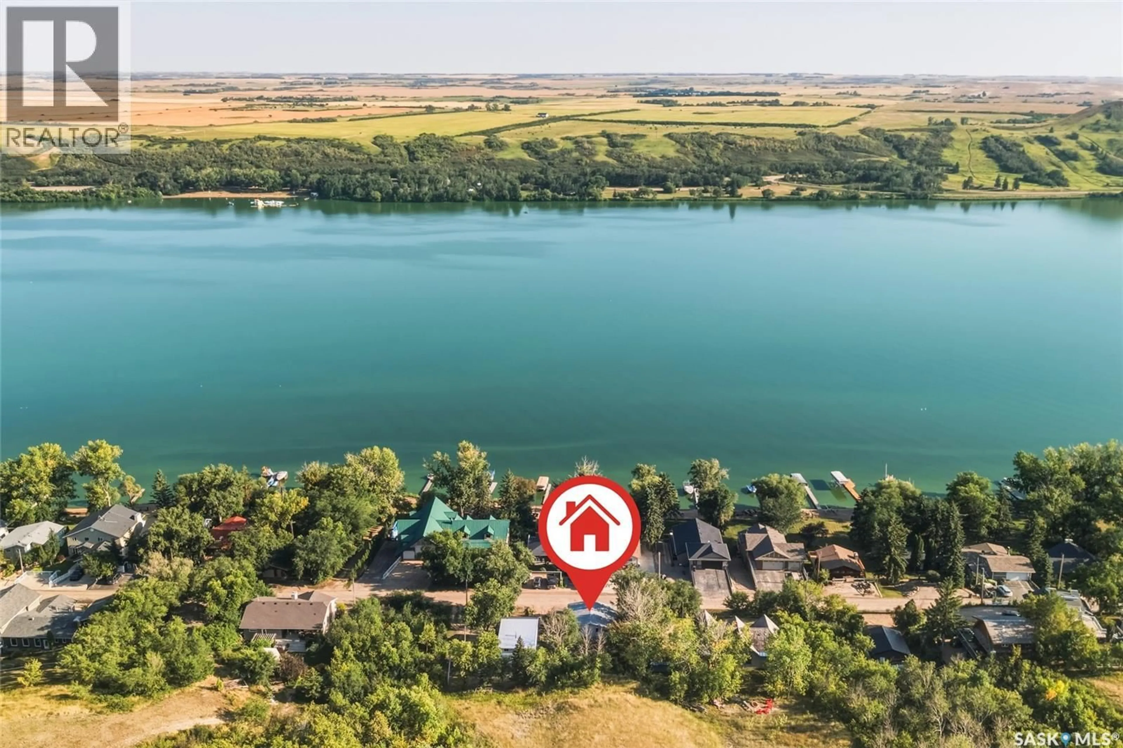A pic from outside/outdoor area/front of a property/back of a property/a pic from drone, water/lake/river/ocean view for 99 SUMMERFELDT DRIVE, Thode Saskatchewan S0K1K0