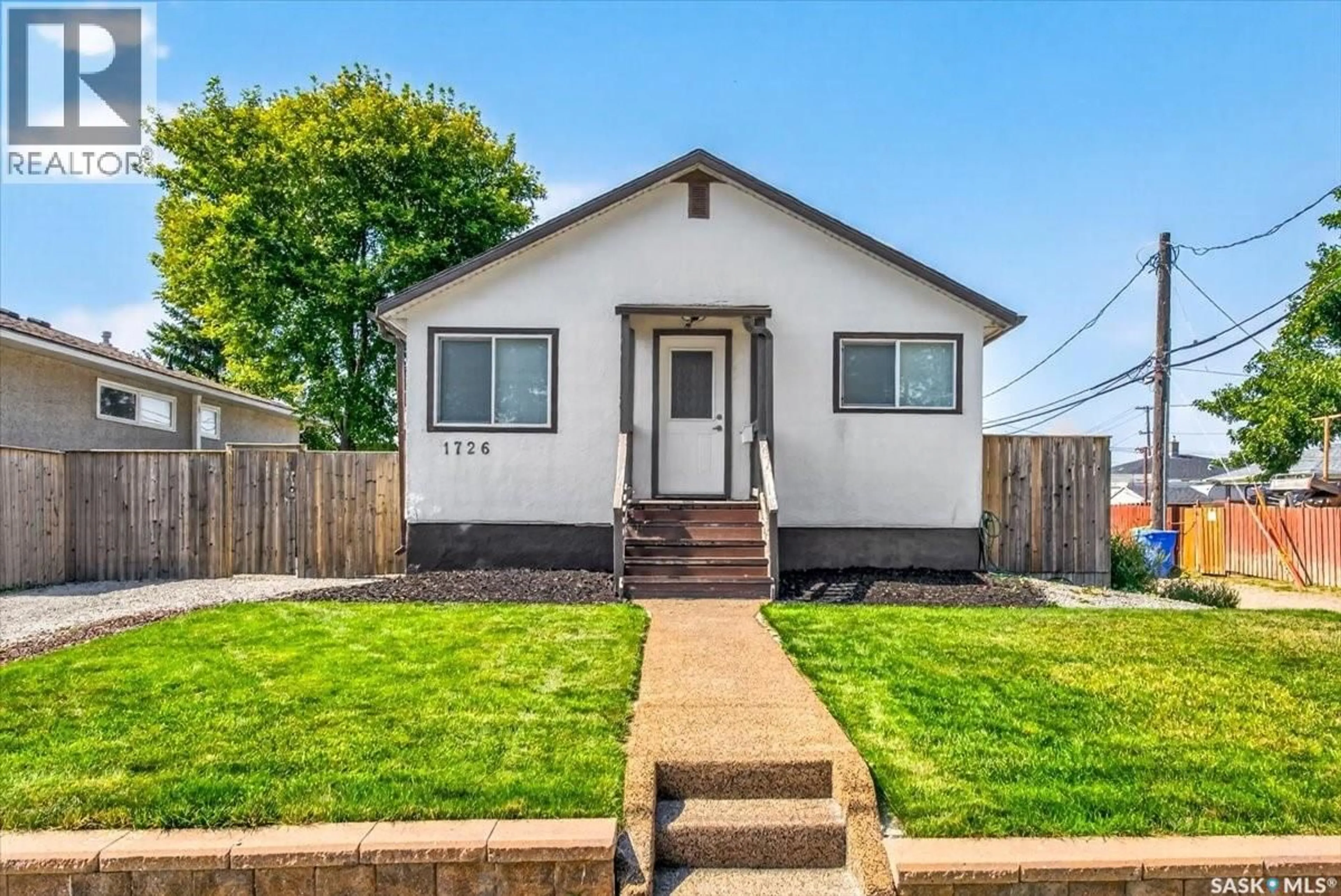 Home with vinyl exterior material, street for 1726 ROTHWELL STREET, Regina Saskatchewan S4N2B9