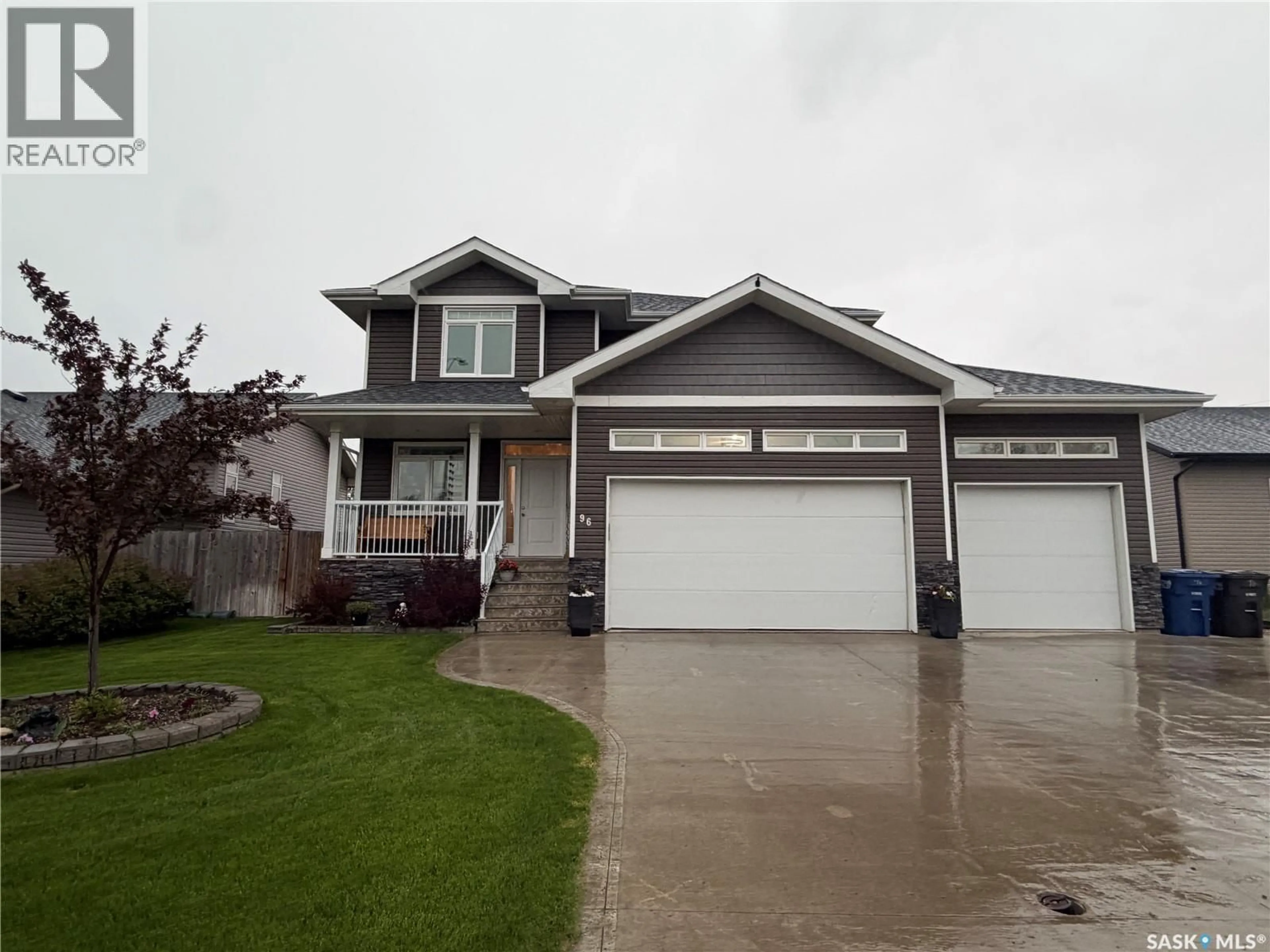 Home with vinyl exterior material, street for 96 101ST STREET, Humboldt Saskatchewan S0K2A0