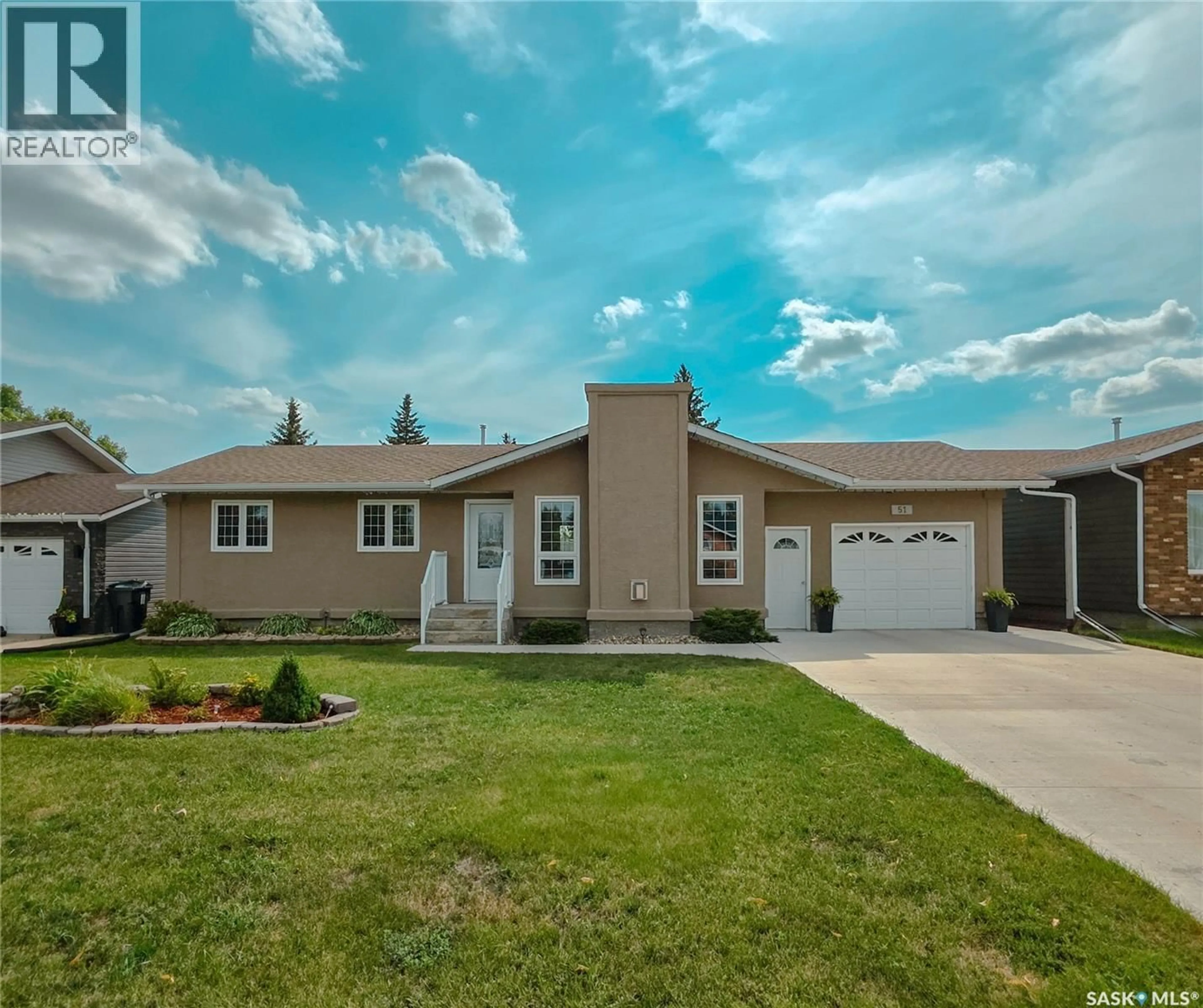 Home with vinyl exterior material, street for 51 VANIER DRIVE, Melville Saskatchewan S0A2P0