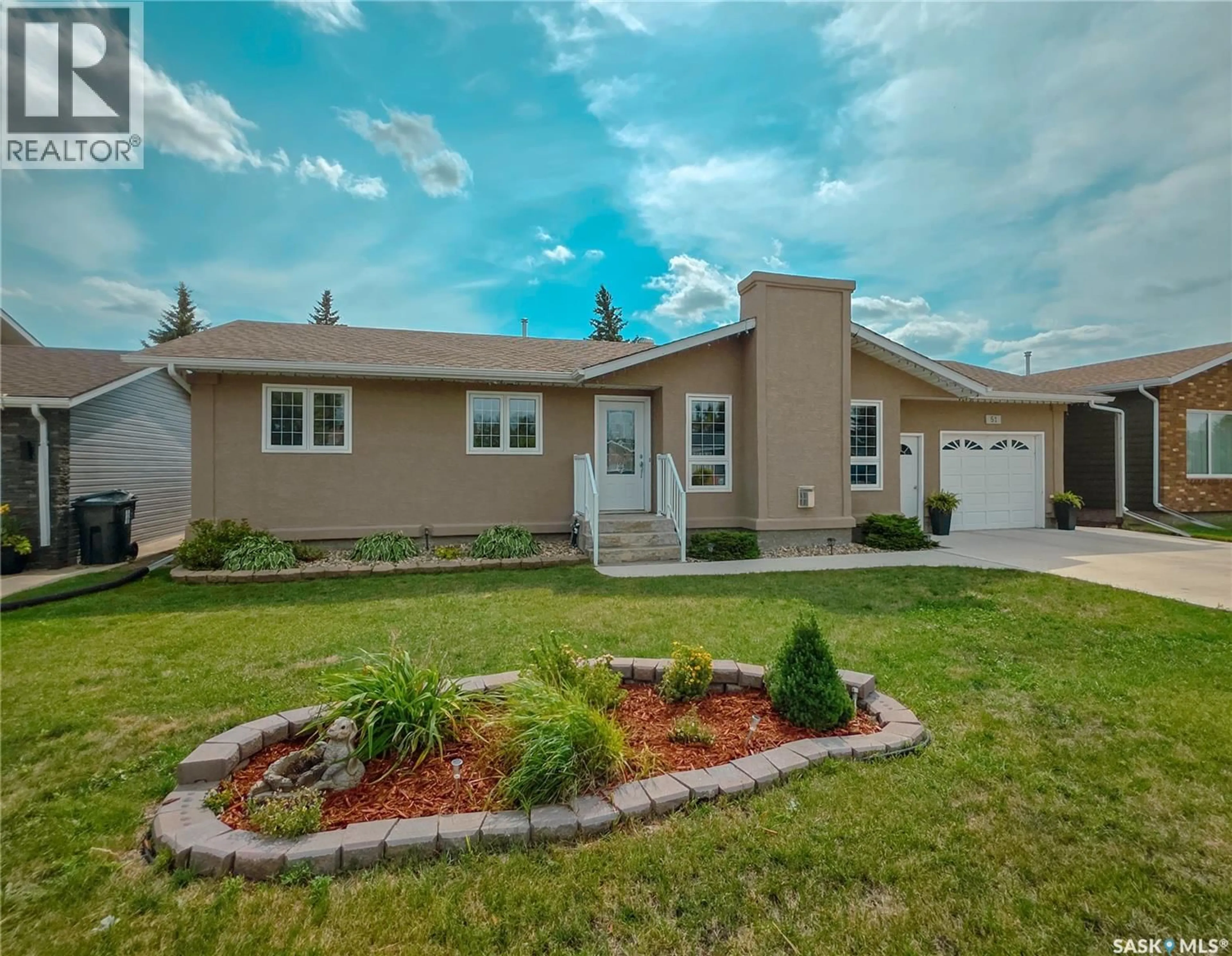 Home with vinyl exterior material, street for 51 VANIER DRIVE, Melville Saskatchewan S0A2P0