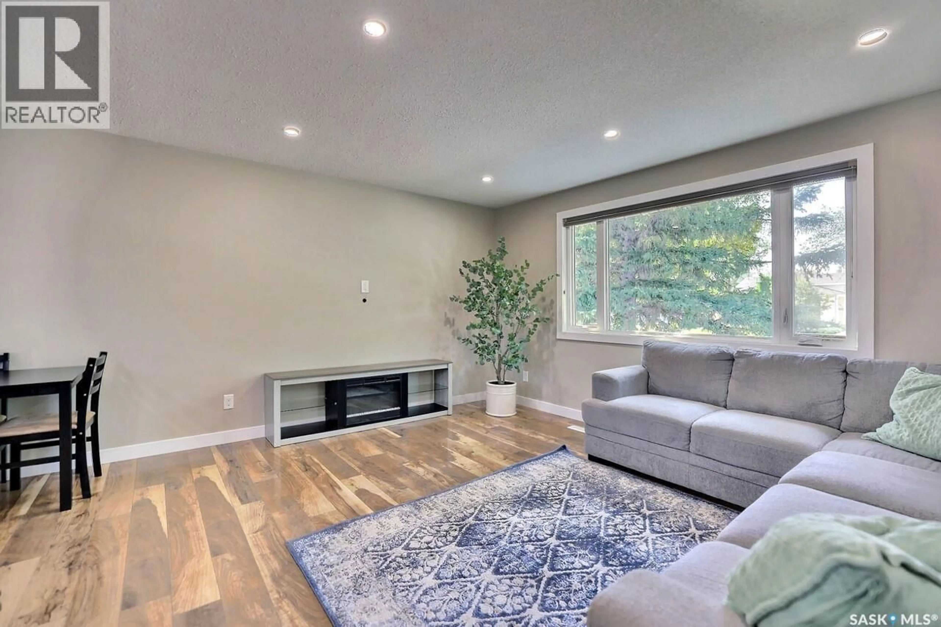 Living room with furniture, unknown for 6918 1ST AVENUE, Regina Saskatchewan S4X1J2