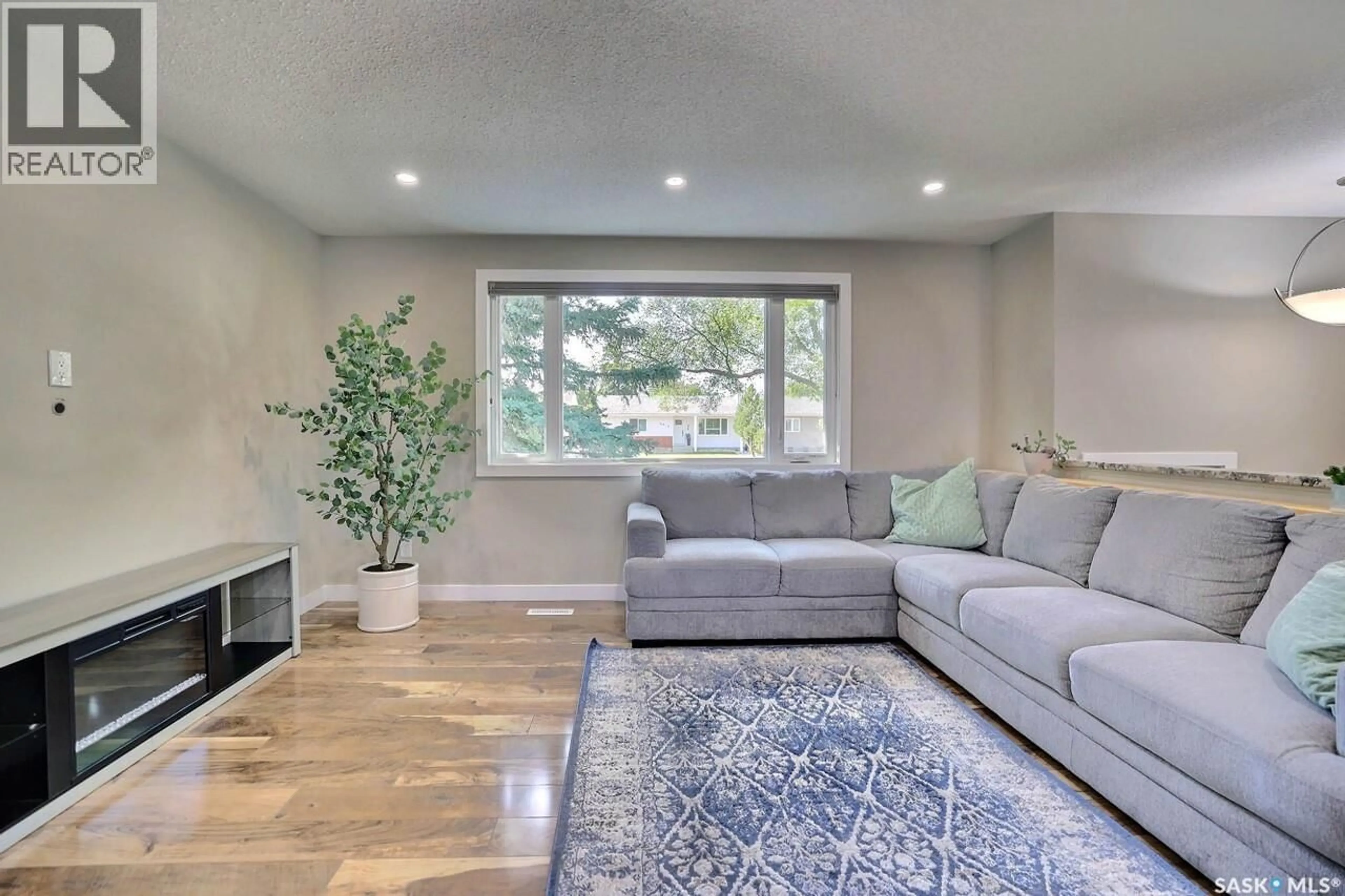 Living room with furniture, unknown for 6918 1ST AVENUE, Regina Saskatchewan S4X1J2