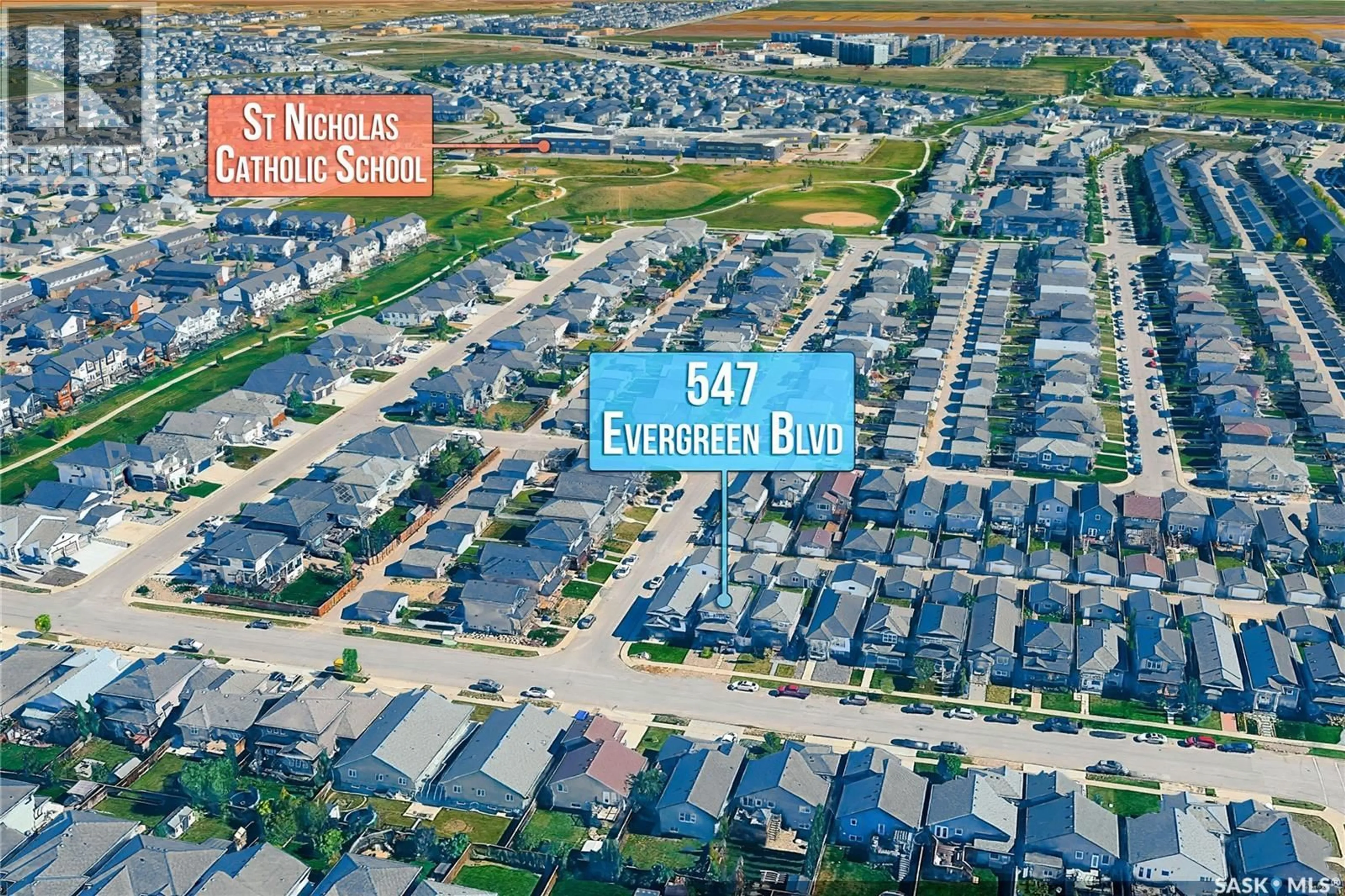 A pic from outside/outdoor area/front of a property/back of a property/a pic from drone, street for 547 EVERGREEN BOULEVARD, Saskatoon Saskatchewan S7W0L4