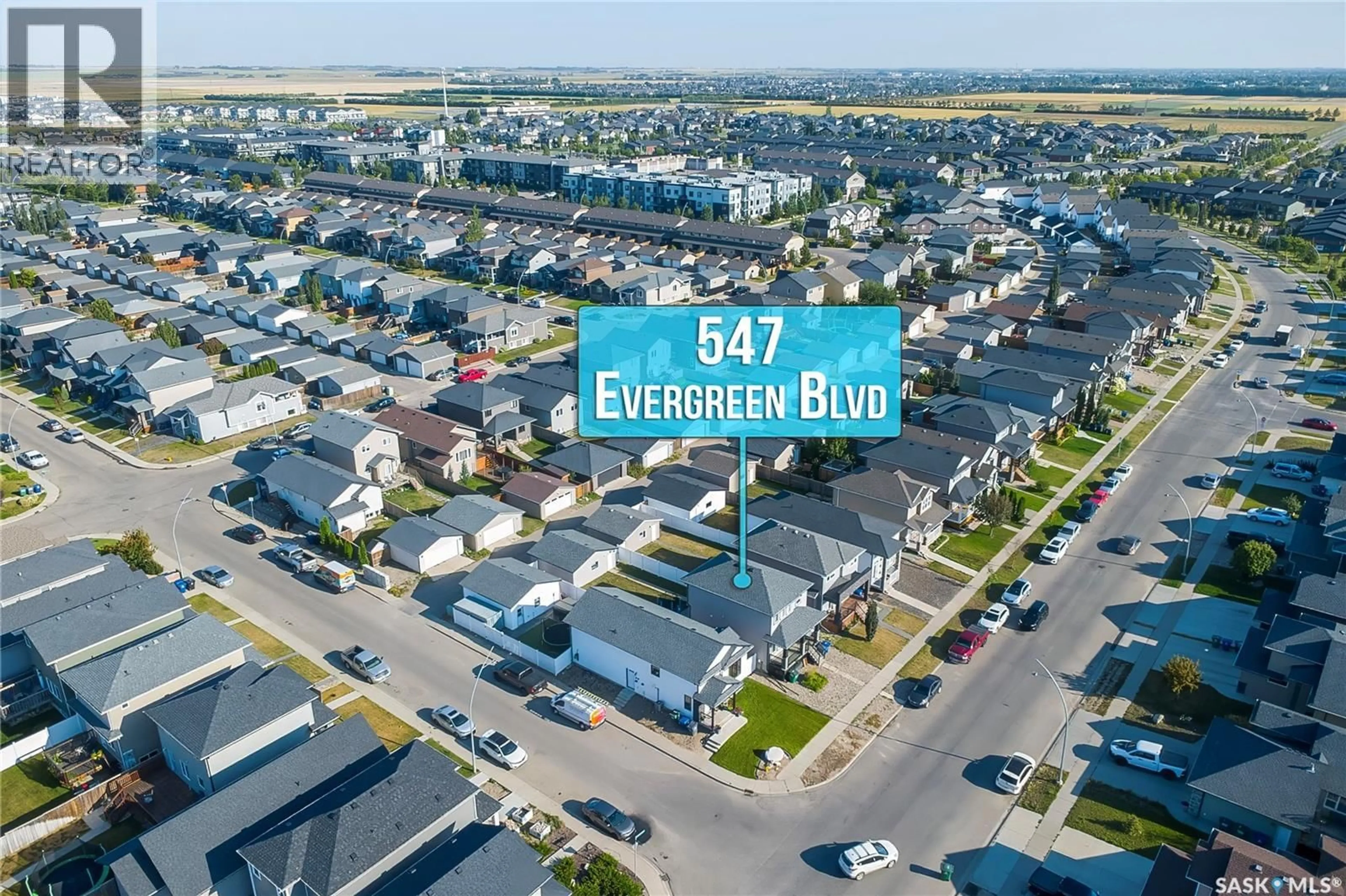 A pic from outside/outdoor area/front of a property/back of a property/a pic from drone, street for 547 EVERGREEN BOULEVARD, Saskatoon Saskatchewan S7W0L4