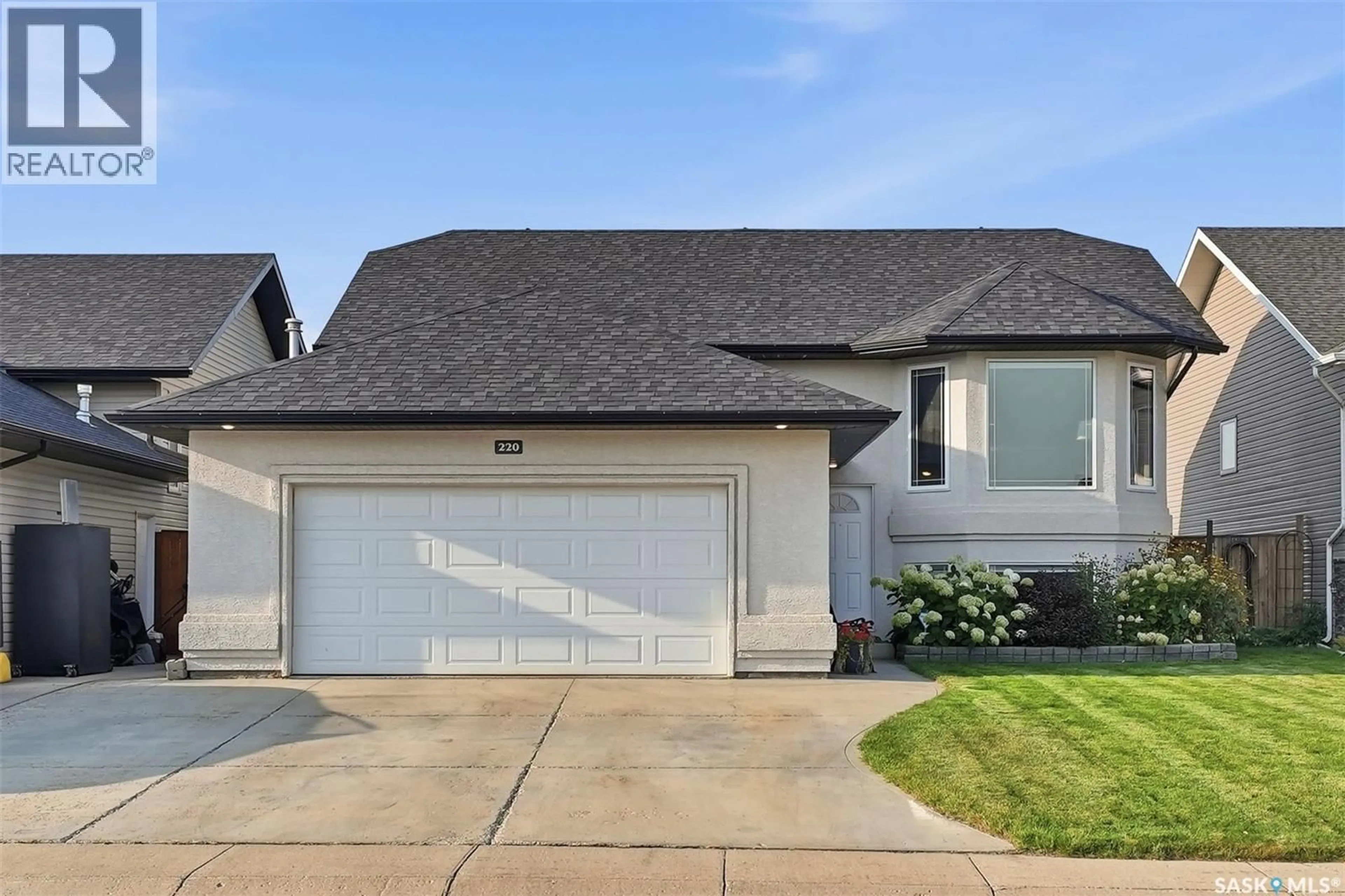 Home with vinyl exterior material, street for 220 FLOYD COURT, Warman Saskatchewan S0K4S1