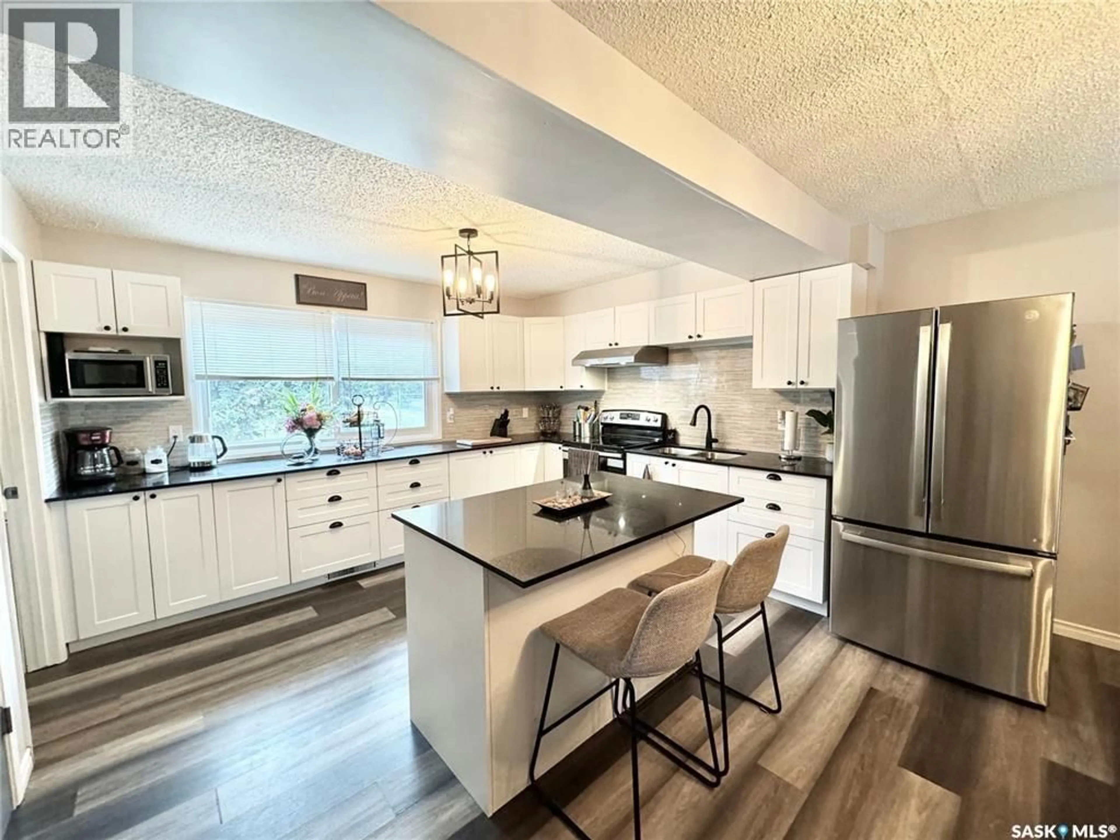 Open concept kitchen, unknown for 1908 3RD AVENUE, Prince Albert Saskatchewan S6V6P6
