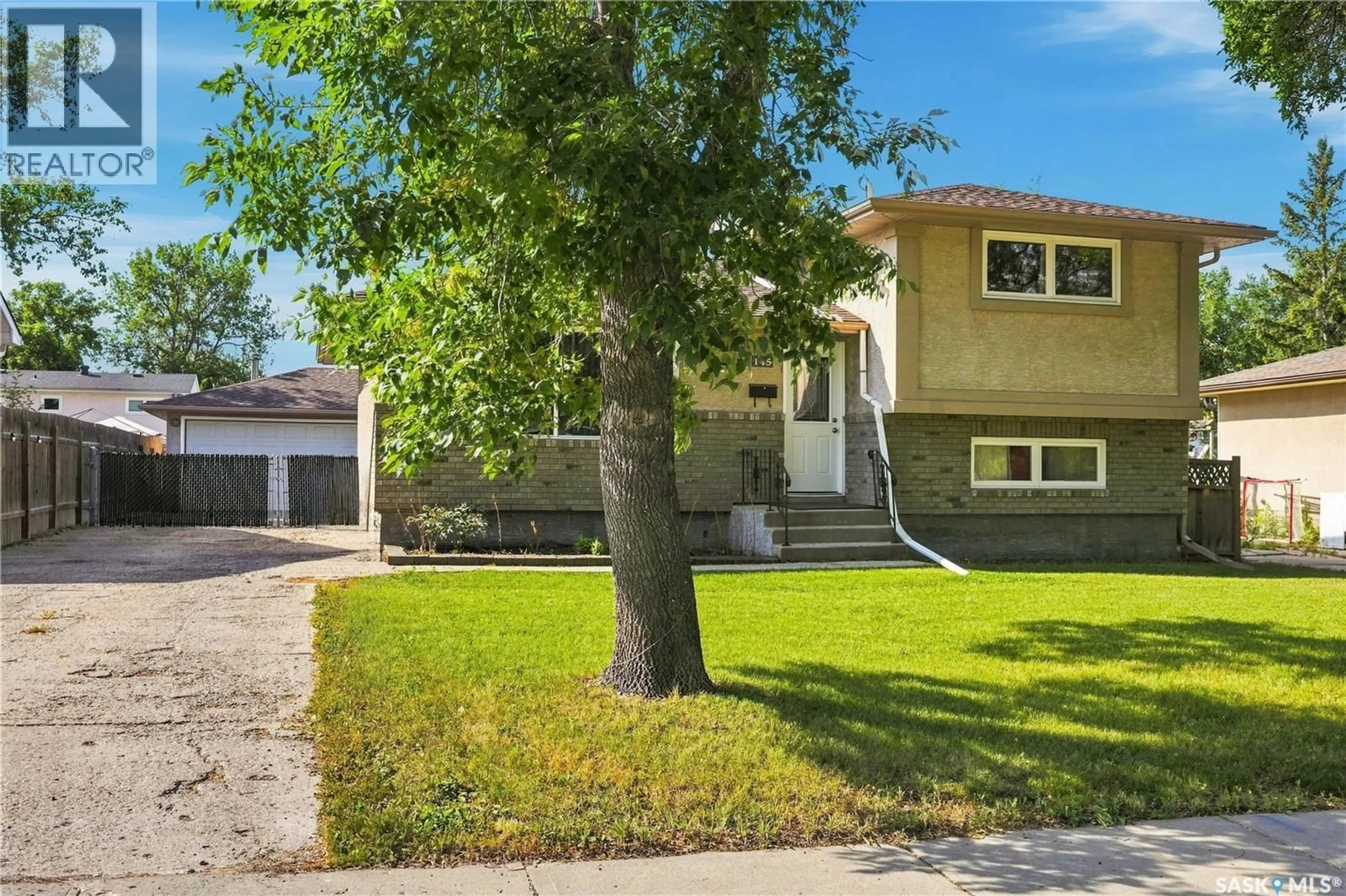 Home with brick exterior material, street for 145 DALGLIESH DRIVE, Regina Saskatchewan S4R5T1