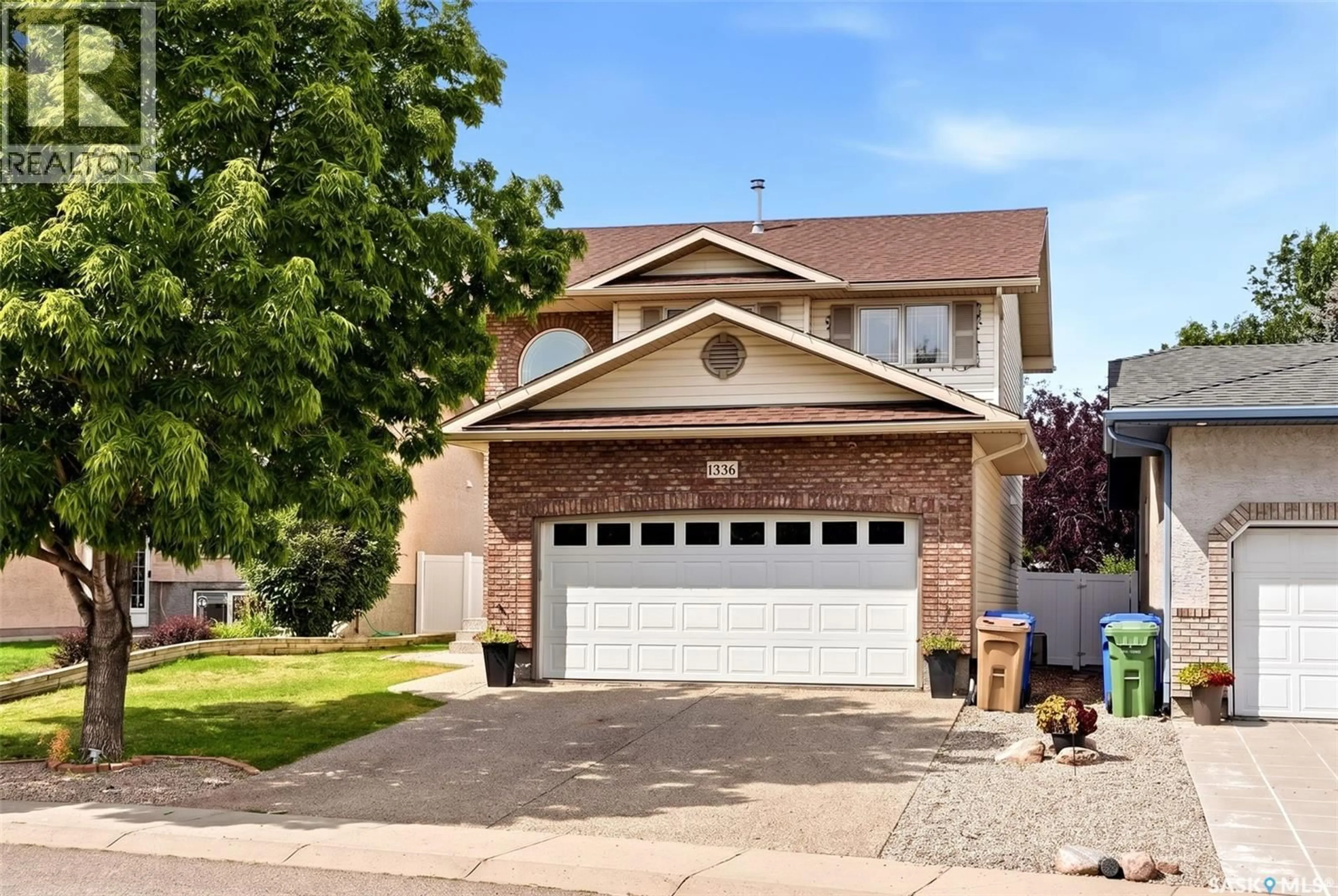 Home with brick exterior material, street for 1336 SMISHEK DRIVE, Regina Saskatchewan S4X4N7