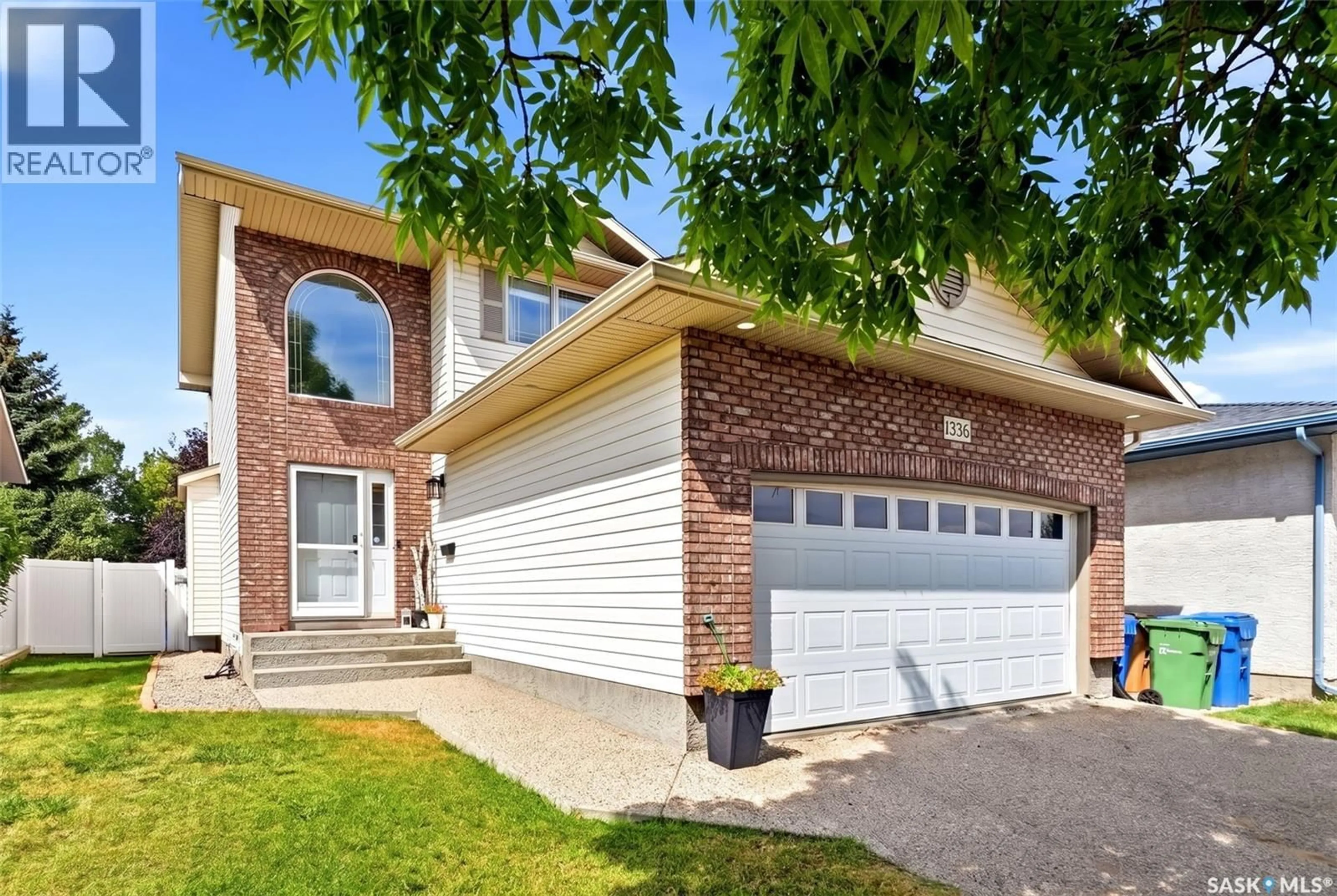 Home with brick exterior material, street for 1336 SMISHEK DRIVE, Regina Saskatchewan S4X4N7