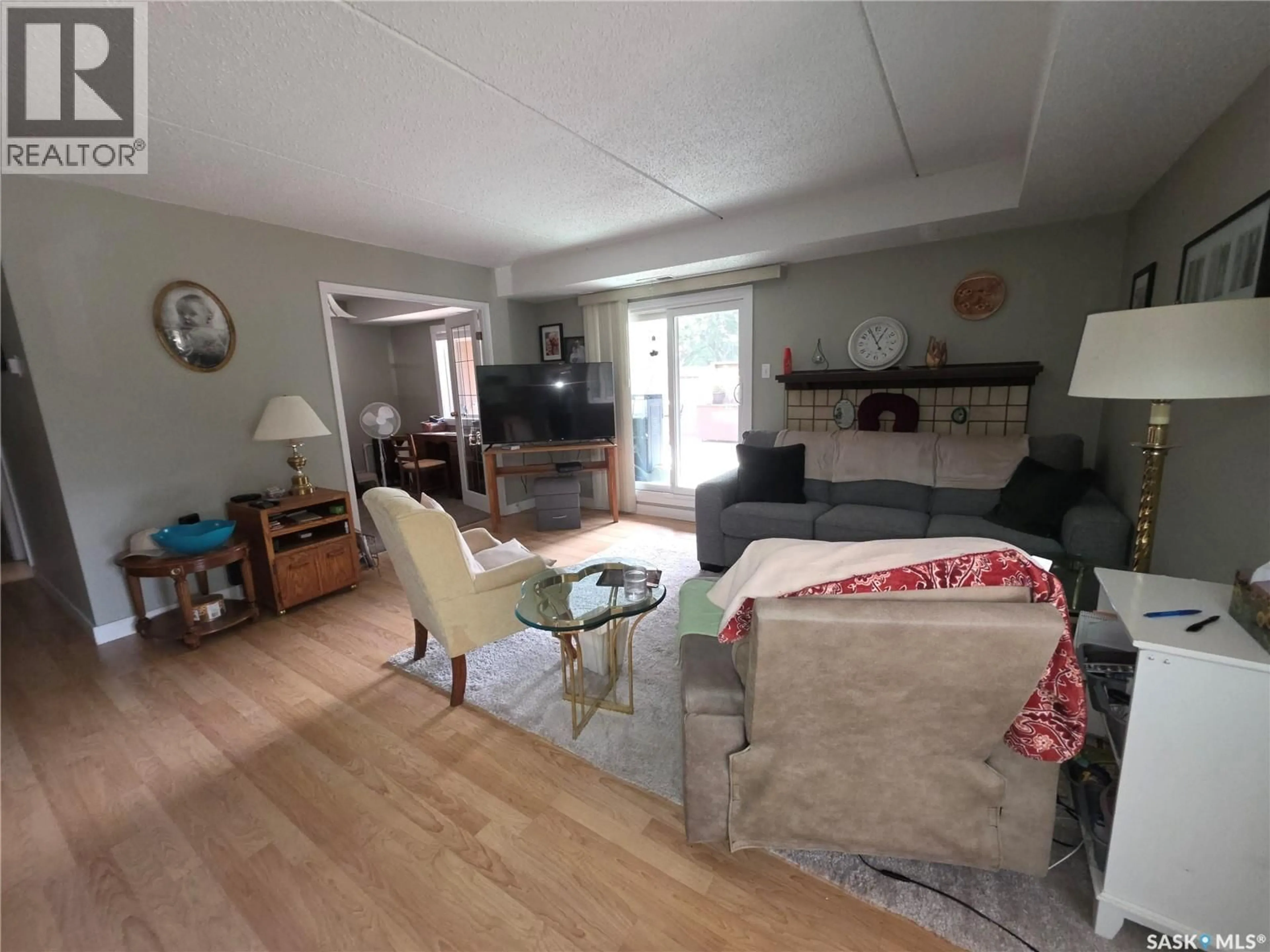 Living room with furniture, unknown for 104 - 449 PENDYGRASSE ROAD, Saskatoon Saskatchewan S7M5C1