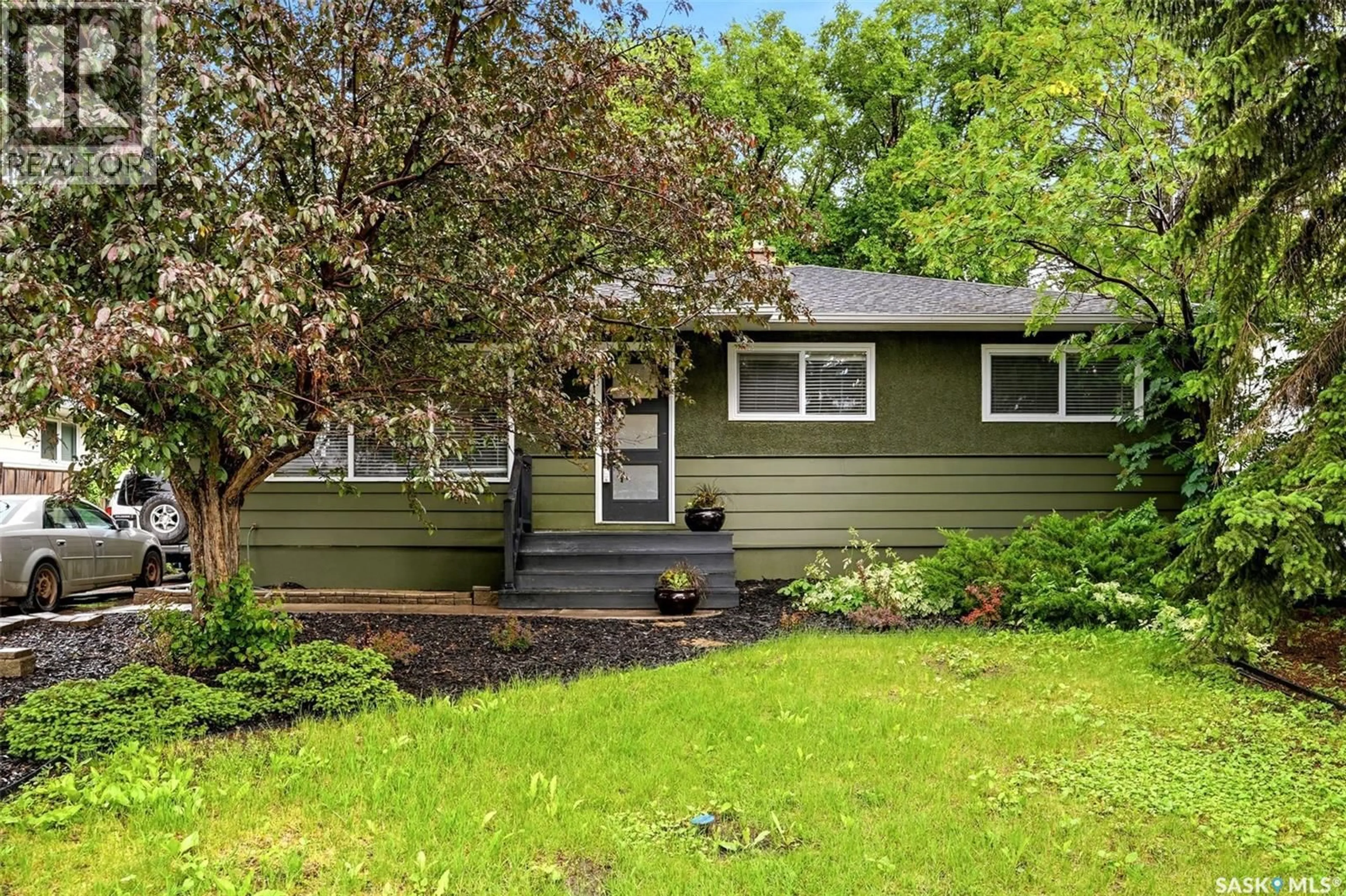 Home with vinyl exterior material, street for 5 DARKE CRESCENT, Regina Saskatchewan S4S2W5