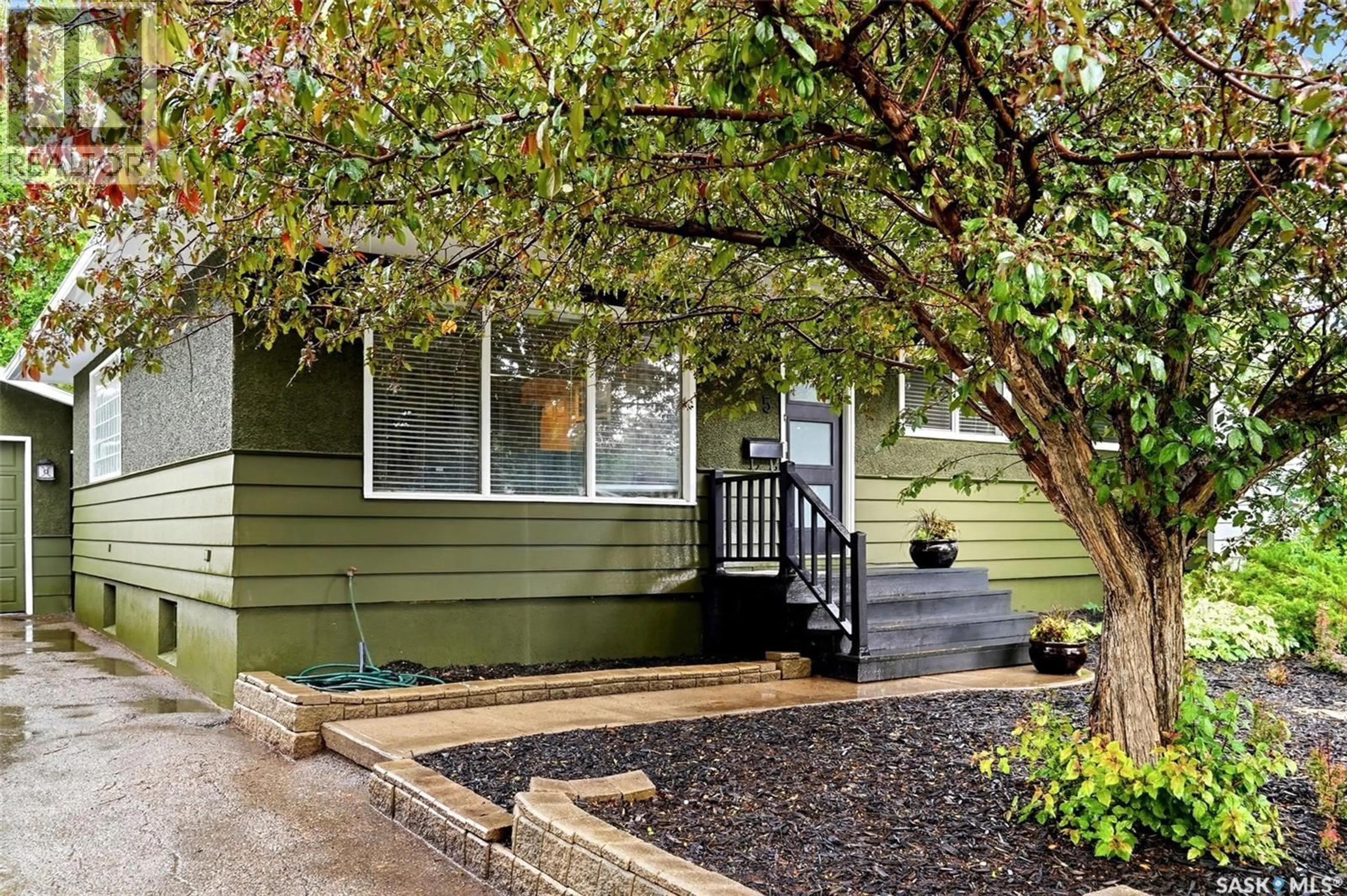 Home with vinyl exterior material, street for 5 DARKE CRESCENT, Regina Saskatchewan S4S2W5