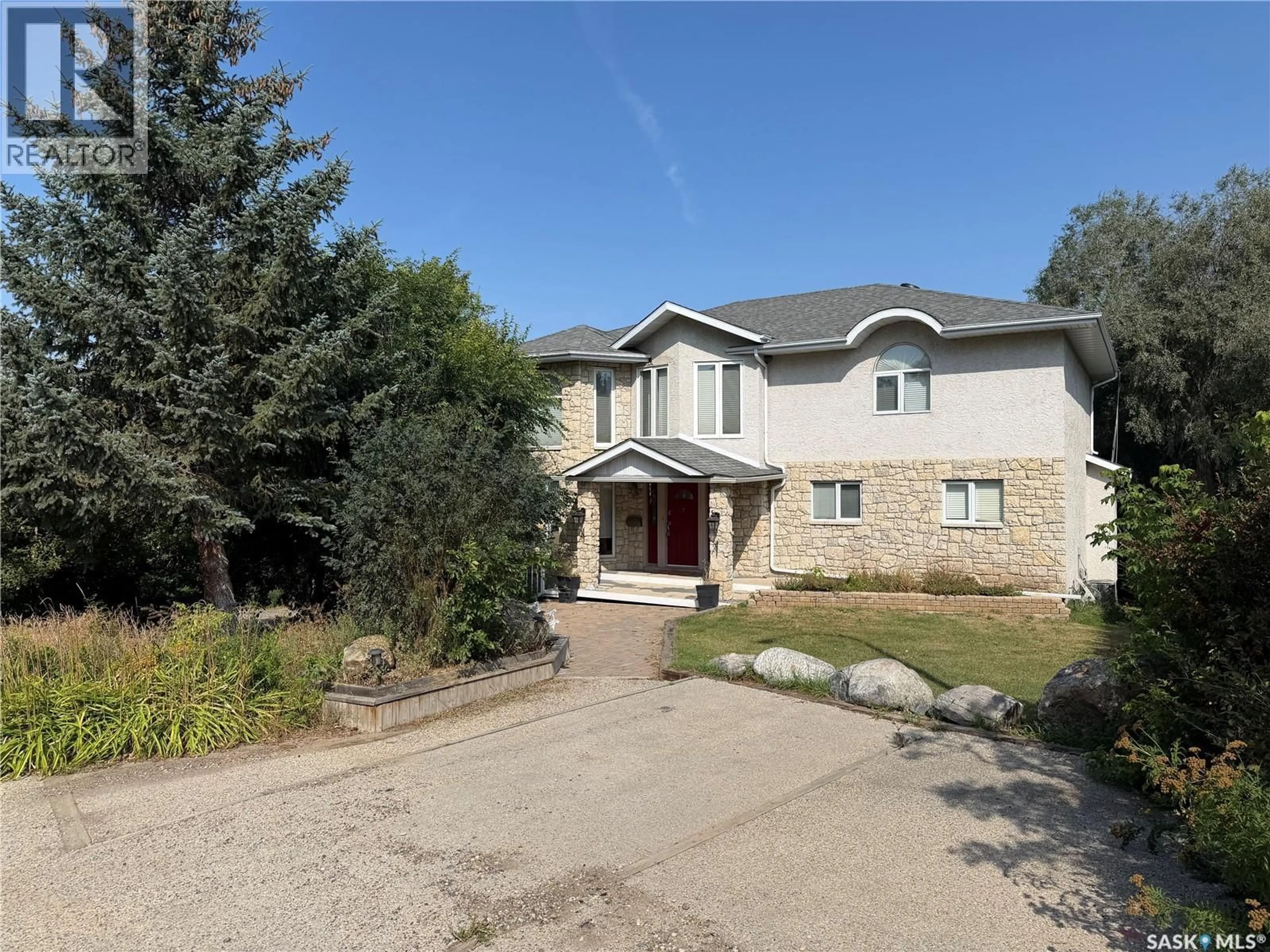 A pic from outside/outdoor area/front of a property/back of a property/a pic from drone, street for 10 MEADOW BAY, Lumsden Saskatchewan S0G3C0