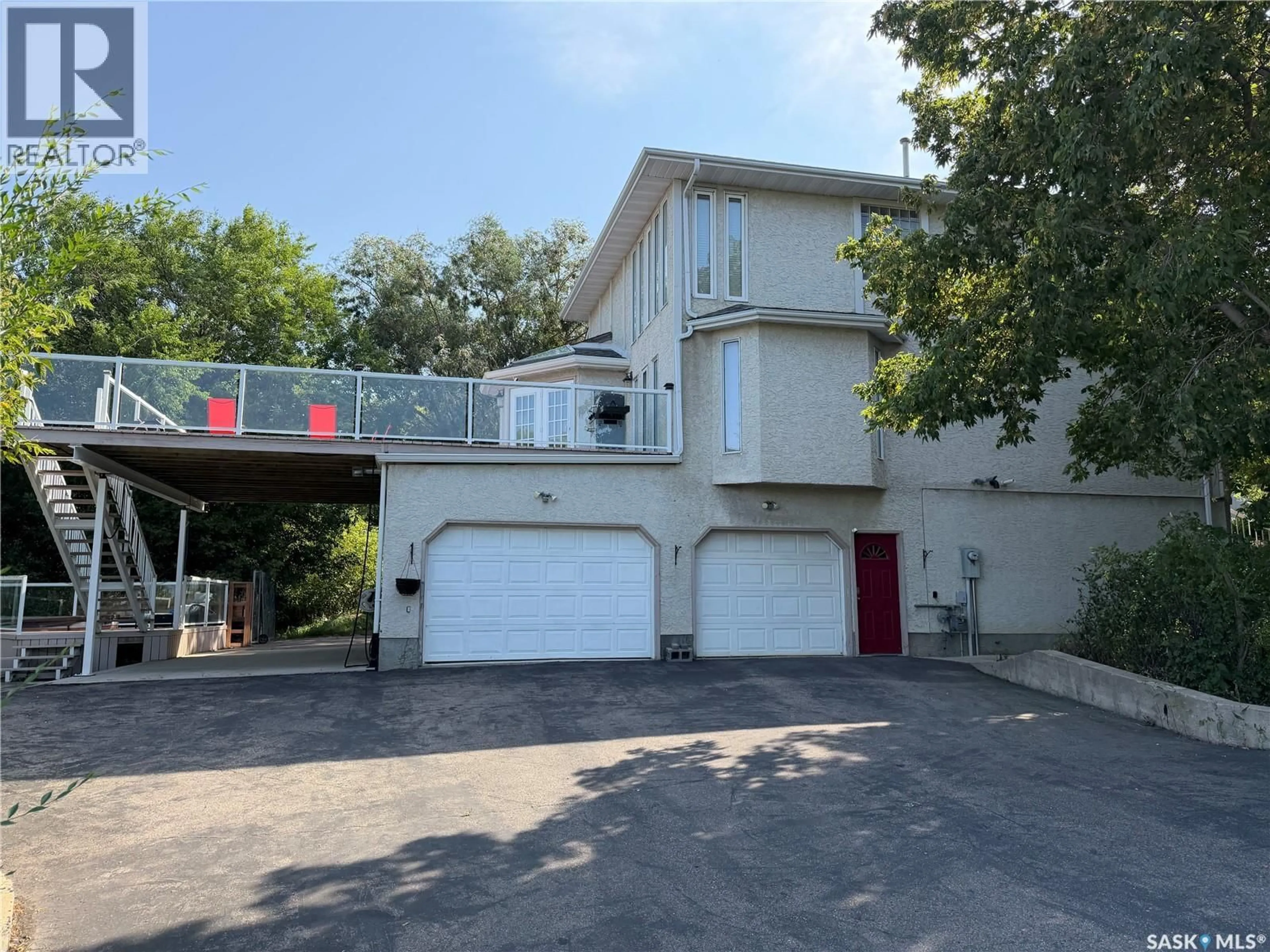 A pic from outside/outdoor area/front of a property/back of a property/a pic from drone, street for 10 MEADOW BAY, Lumsden Saskatchewan S0G3C0