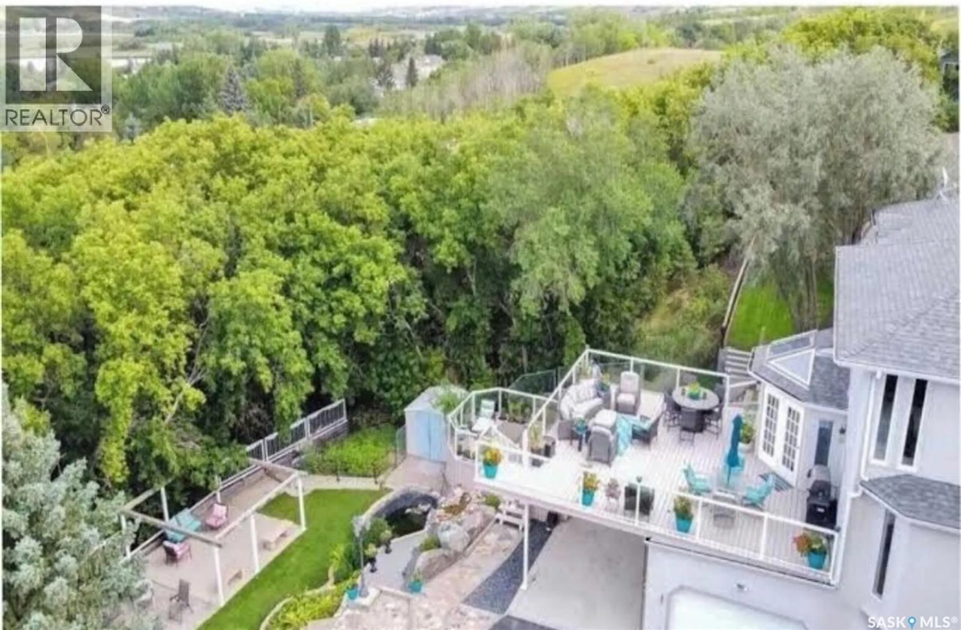 A pic from outside/outdoor area/front of a property/back of a property/a pic from drone, unknown for 10 MEADOW BAY, Lumsden Saskatchewan S0G3C0