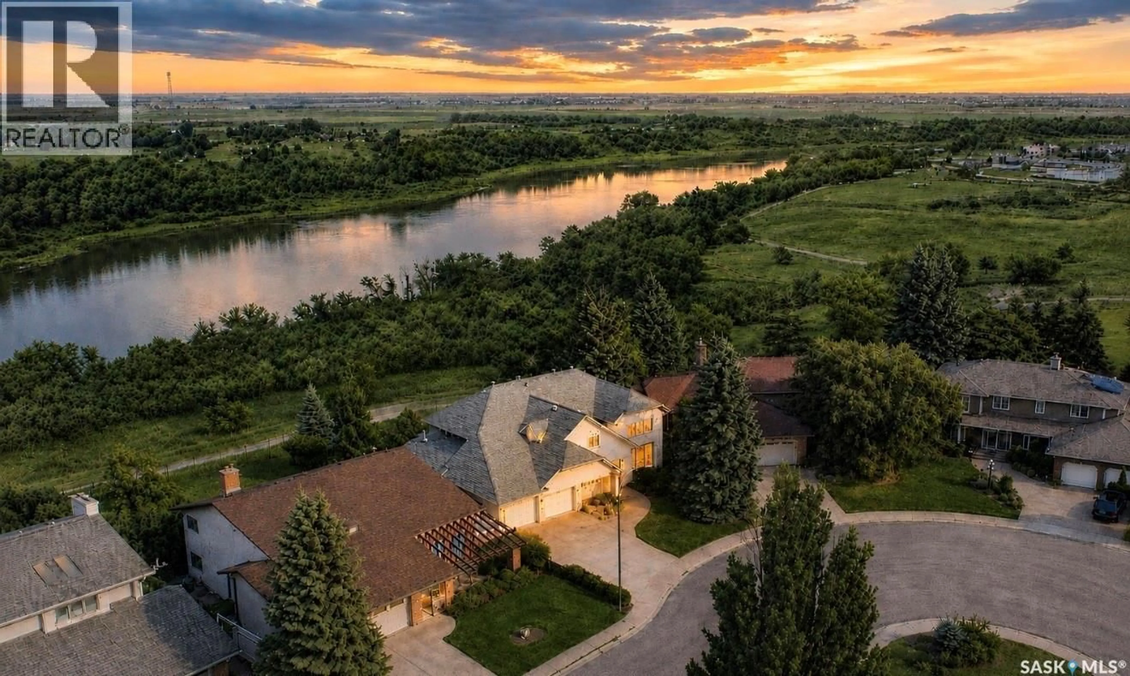A pic from outside/outdoor area/front of a property/back of a property/a pic from drone, water/lake/river/ocean view for 323 MALLIN CRESCENT, Saskatoon Saskatchewan S7K7X2