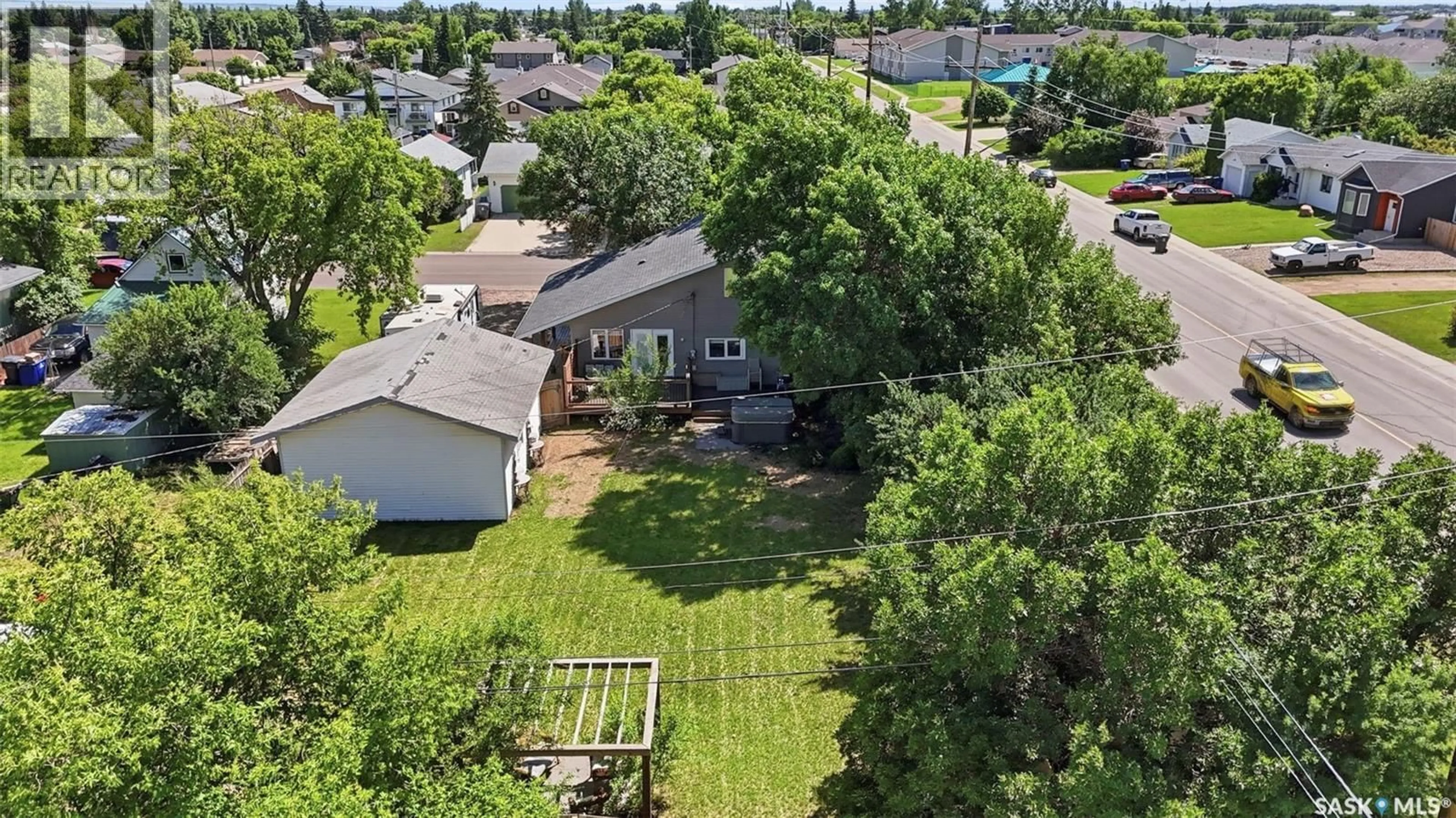A pic from outside/outdoor area/front of a property/back of a property/a pic from drone, street for 312 3RD STREET, Warman Saskatchewan S0K4S2