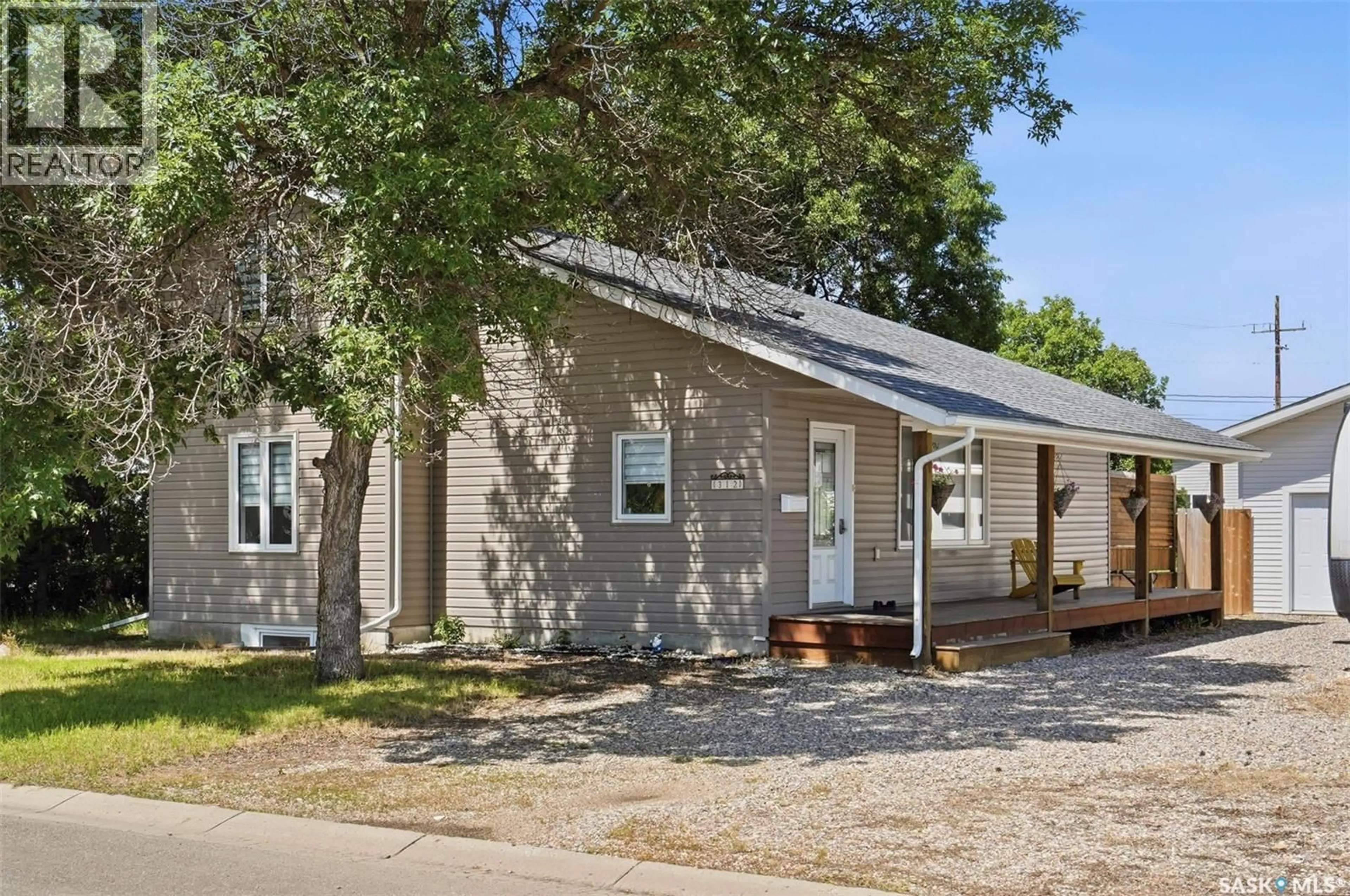 Home with vinyl exterior material, street for 312 3RD STREET, Warman Saskatchewan S0K4S2