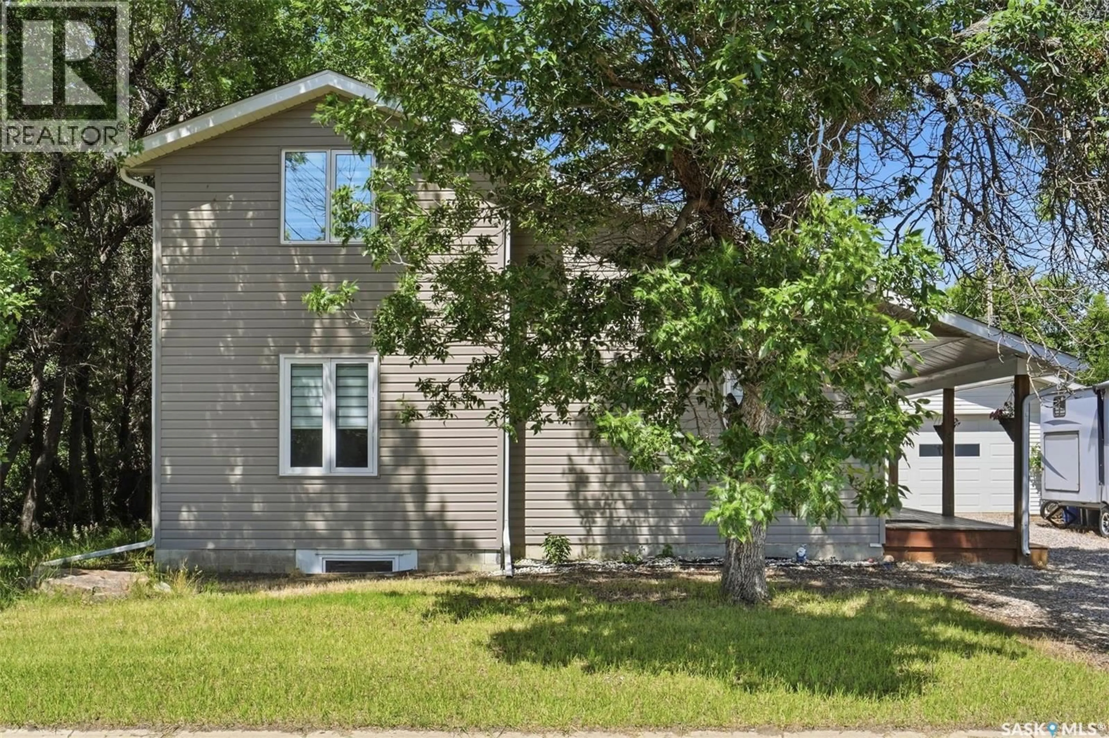 Home with vinyl exterior material, street for 312 3RD STREET, Warman Saskatchewan S0K4S2