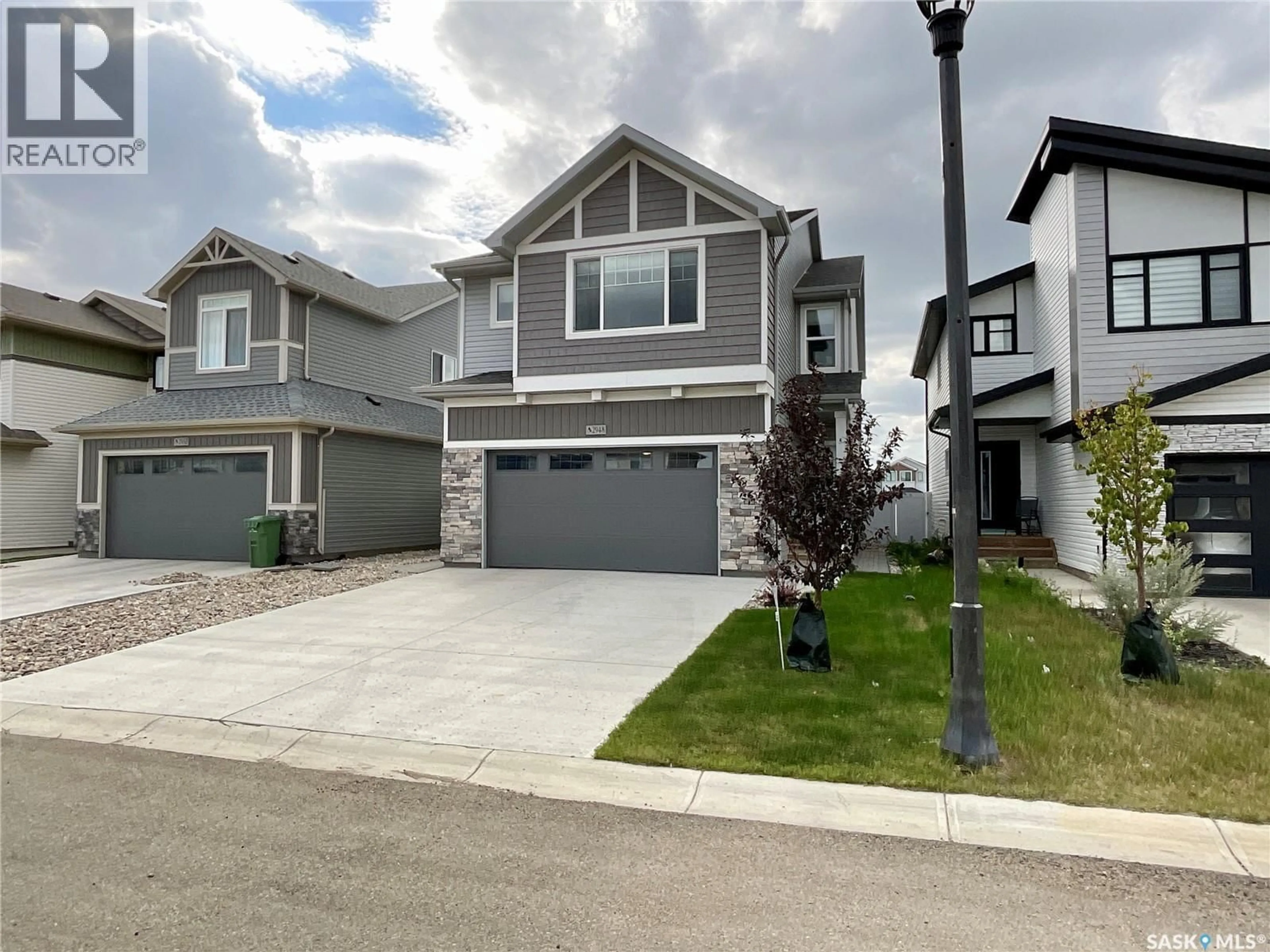 Home with vinyl exterior material, street for 2948 TROMBLEY STREET, Regina Saskatchewan S4V3Y7