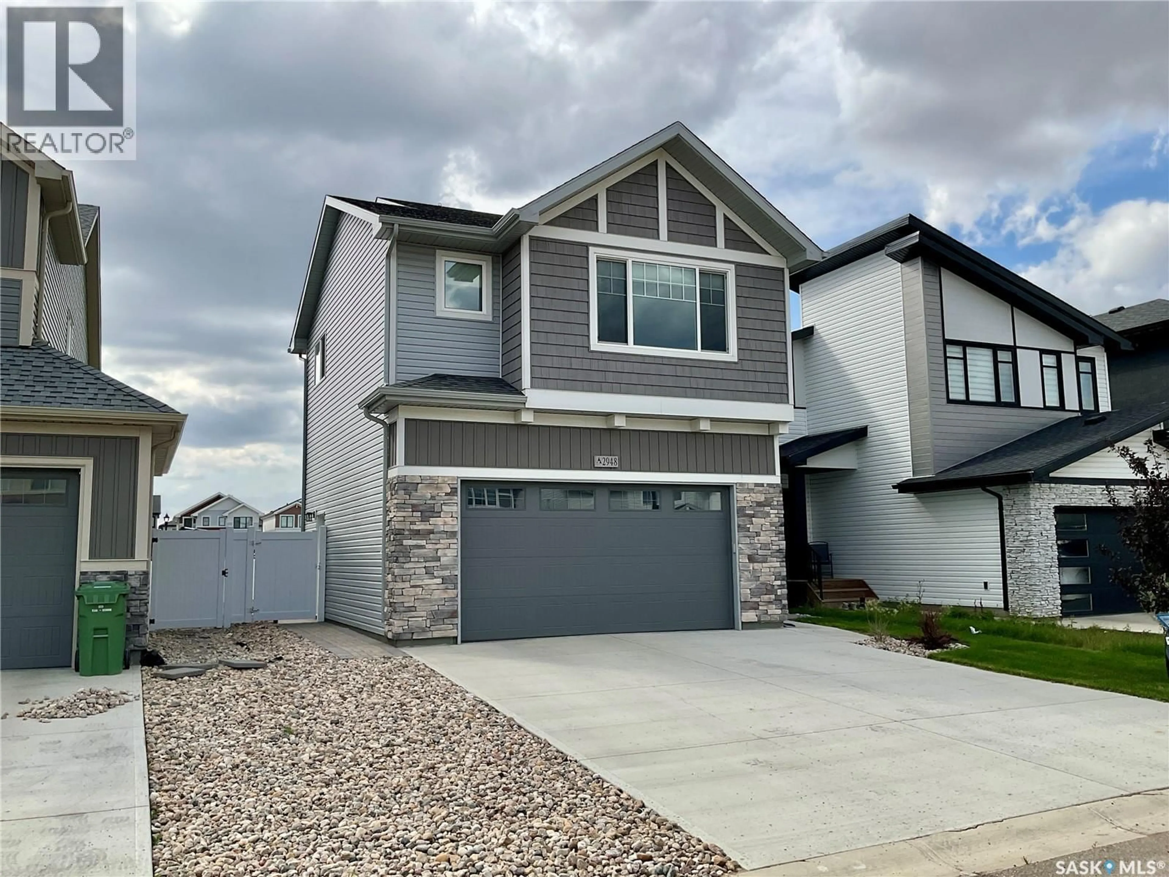 Home with vinyl exterior material, street for 2948 TROMBLEY STREET, Regina Saskatchewan S4V3Y7
