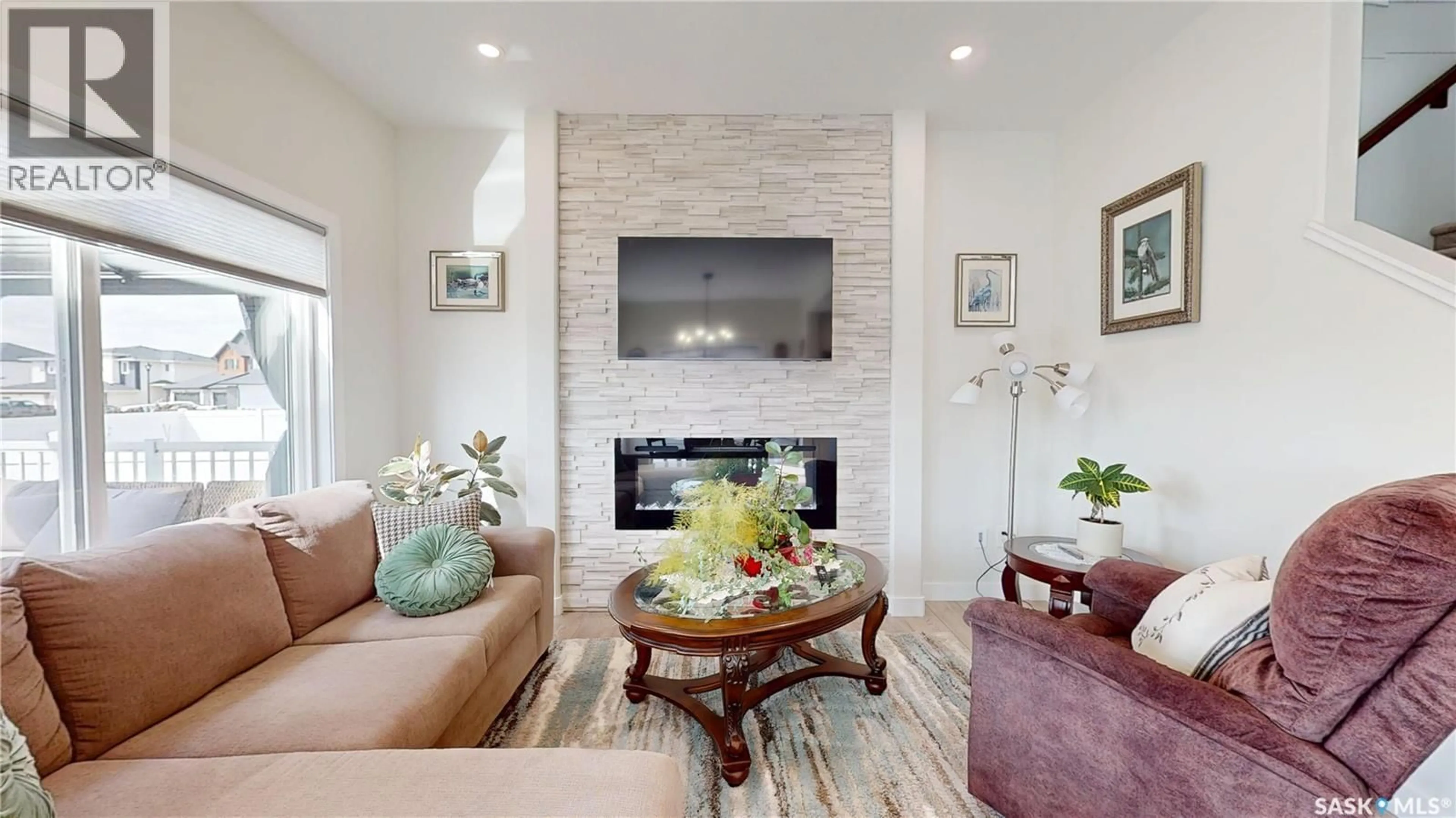 Living room with furniture, ceramic/tile floor for 2948 TROMBLEY STREET, Regina Saskatchewan S4V3Y7