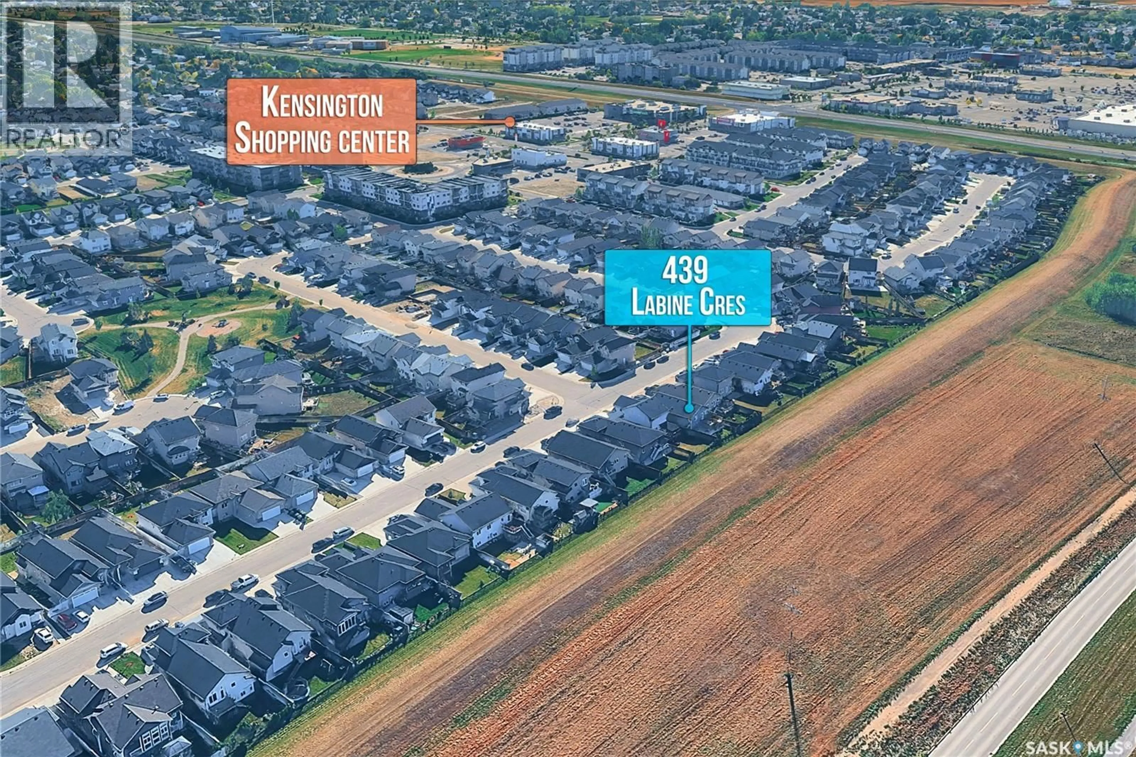 A pic from outside/outdoor area/front of a property/back of a property/a pic from drone, street for 439 LABINE CRESCENT, Saskatoon Saskatchewan S7L5Y5