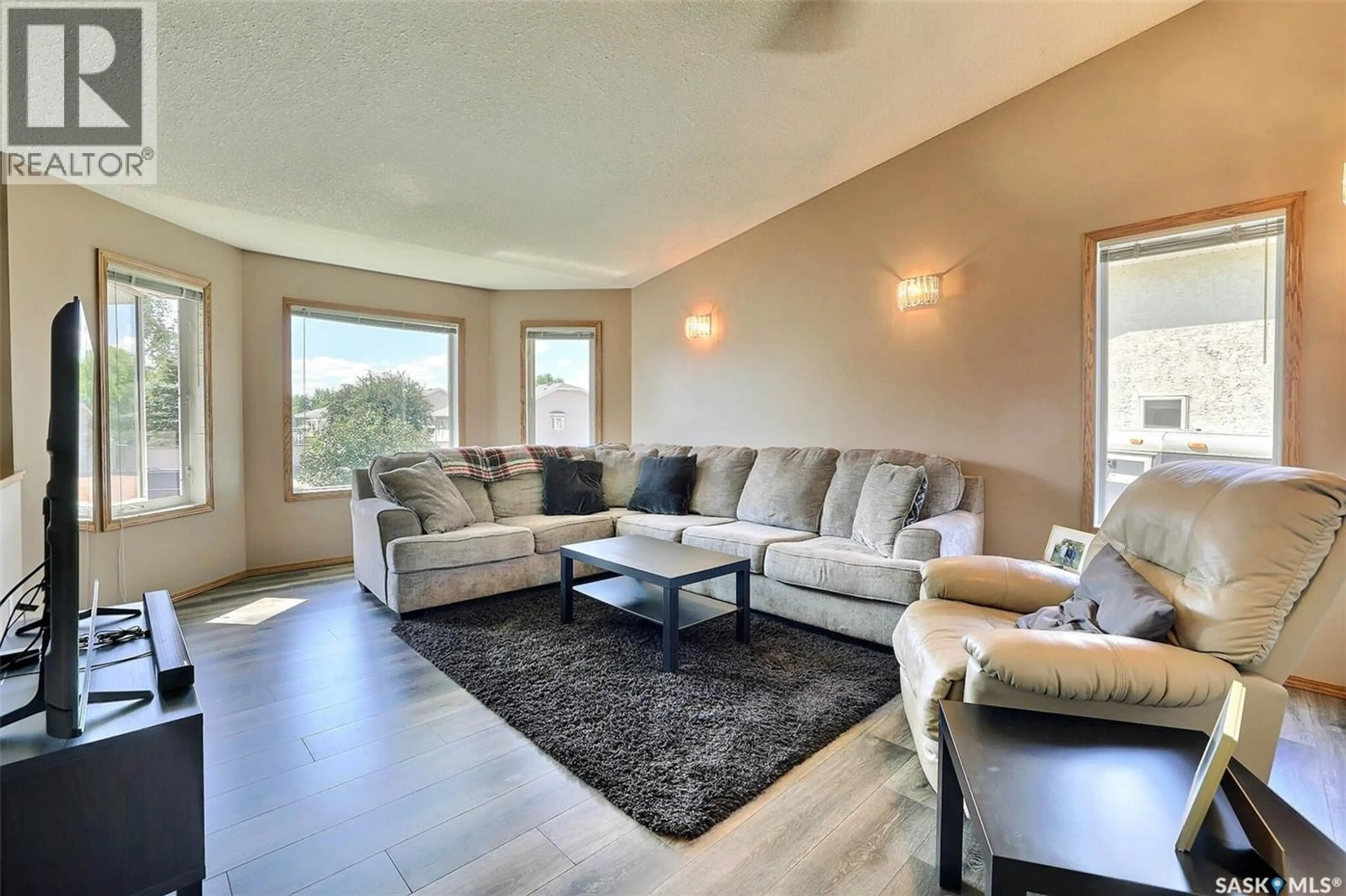 Living room with furniture, unknown for 318 HILLSIDE CRESCENT, Pilot Butte Saskatchewan S0G3Z0