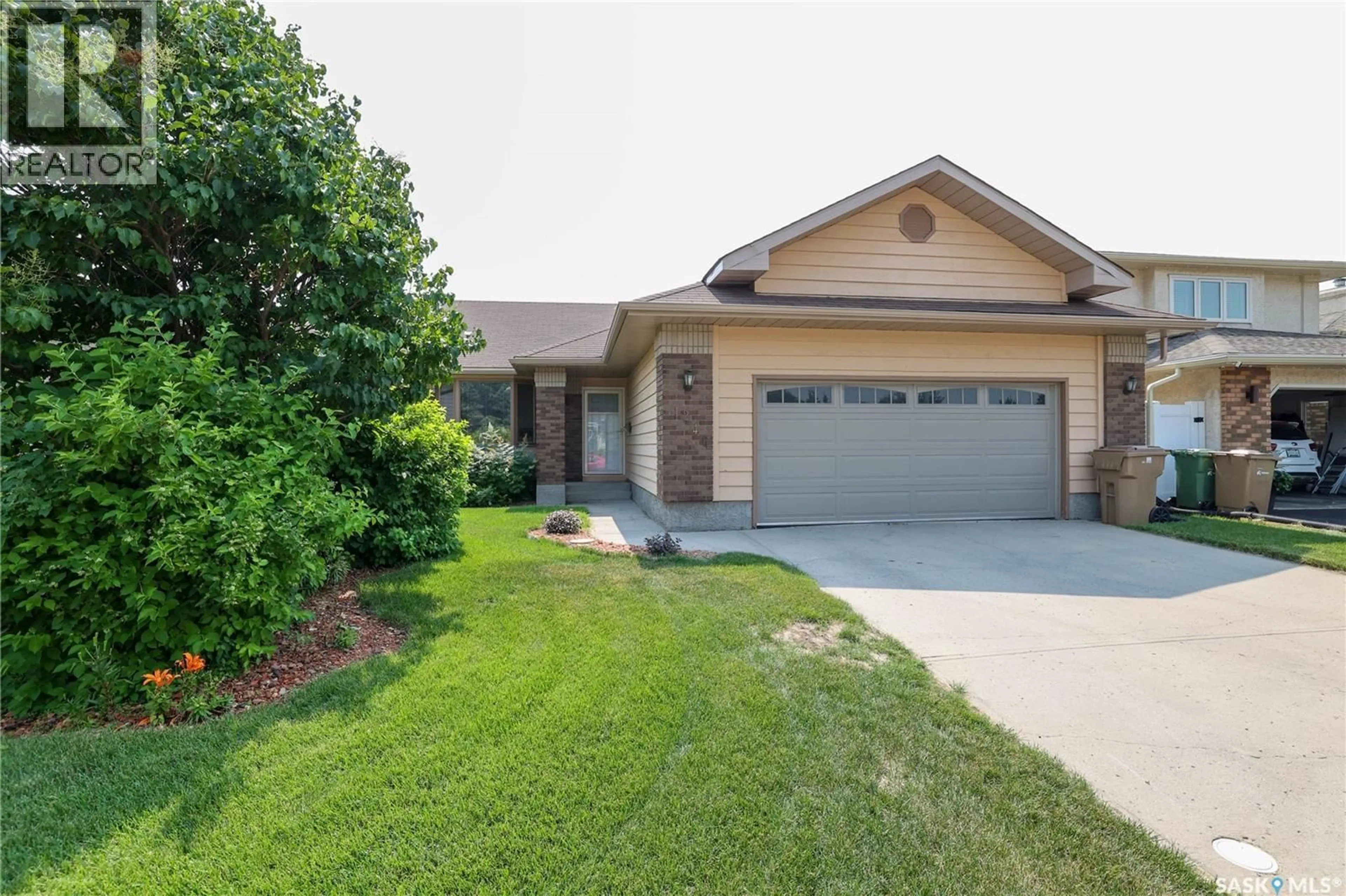 Home with brick exterior material, street for 1246 GLASSER BAY, Regina Saskatchewan S4X4K2