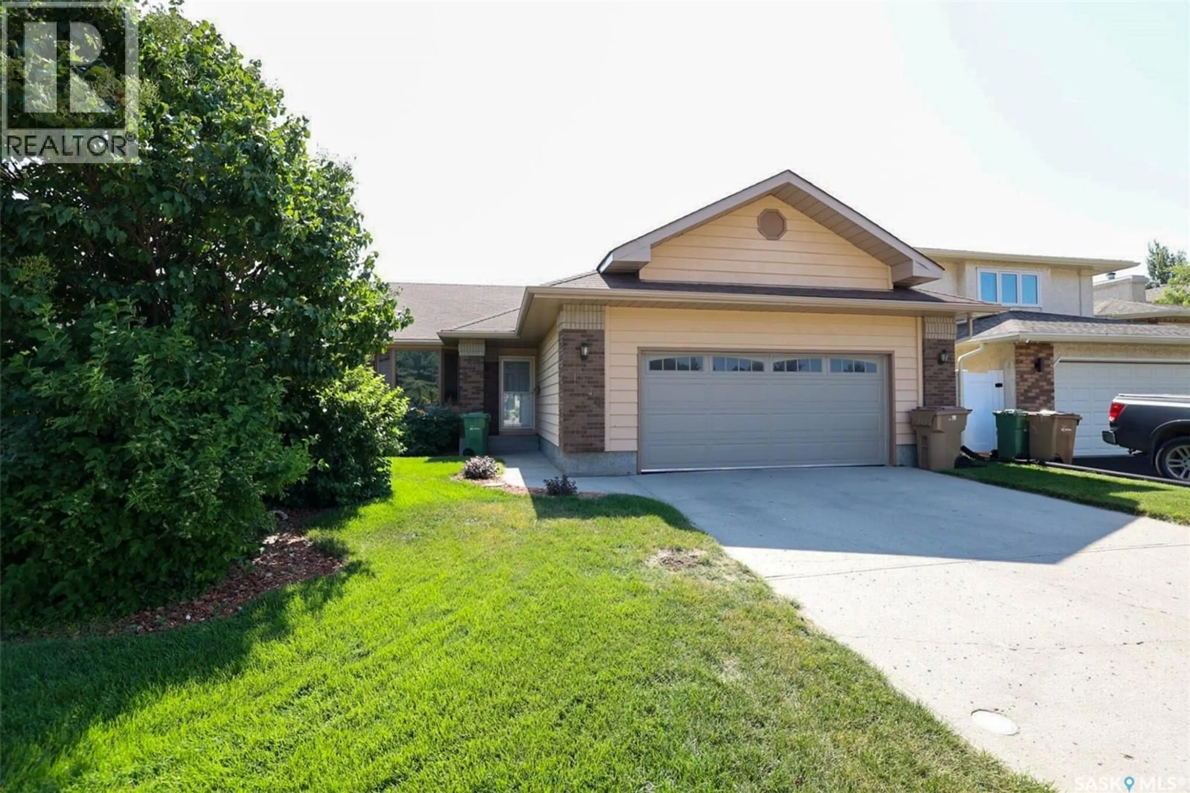 Home with brick exterior material, street for 1246 GLASSER BAY, Regina Saskatchewan S4X4K2