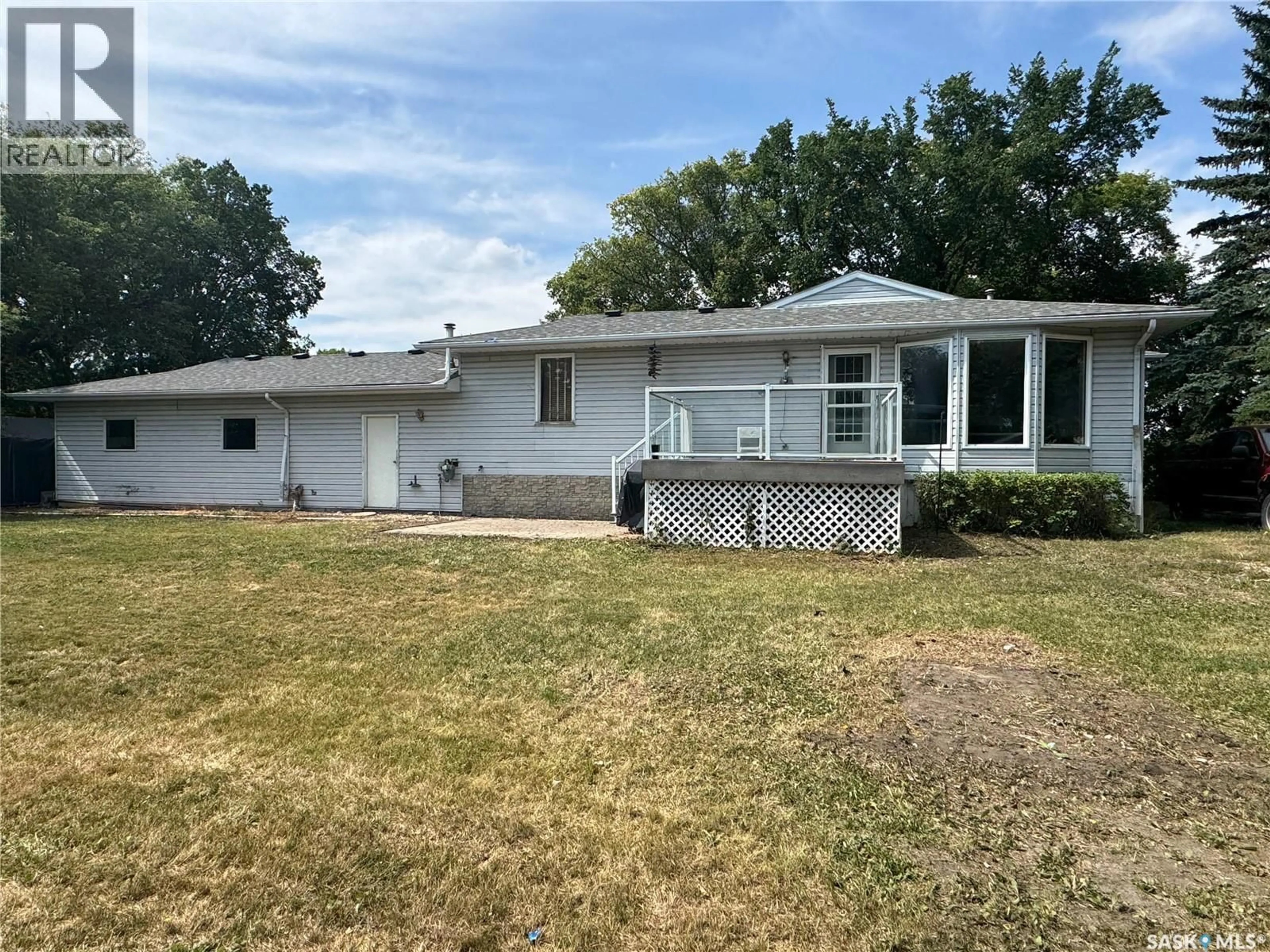 Home with vinyl exterior material, street for 401 POPLAR STREET, Wolseley Saskatchewan S0G5H0