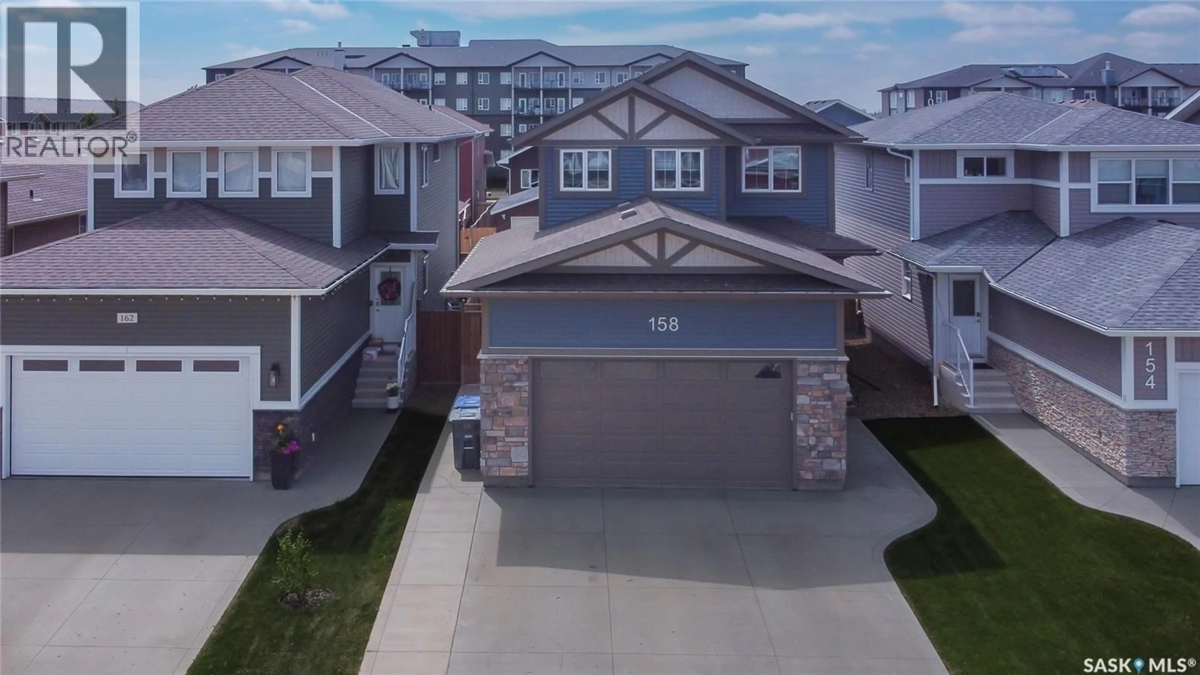 A pic from outside/outdoor area/front of a property/back of a property/a pic from drone, street for 158 COWAN CRESCENT, Martensville Saskatchewan S0K0A2