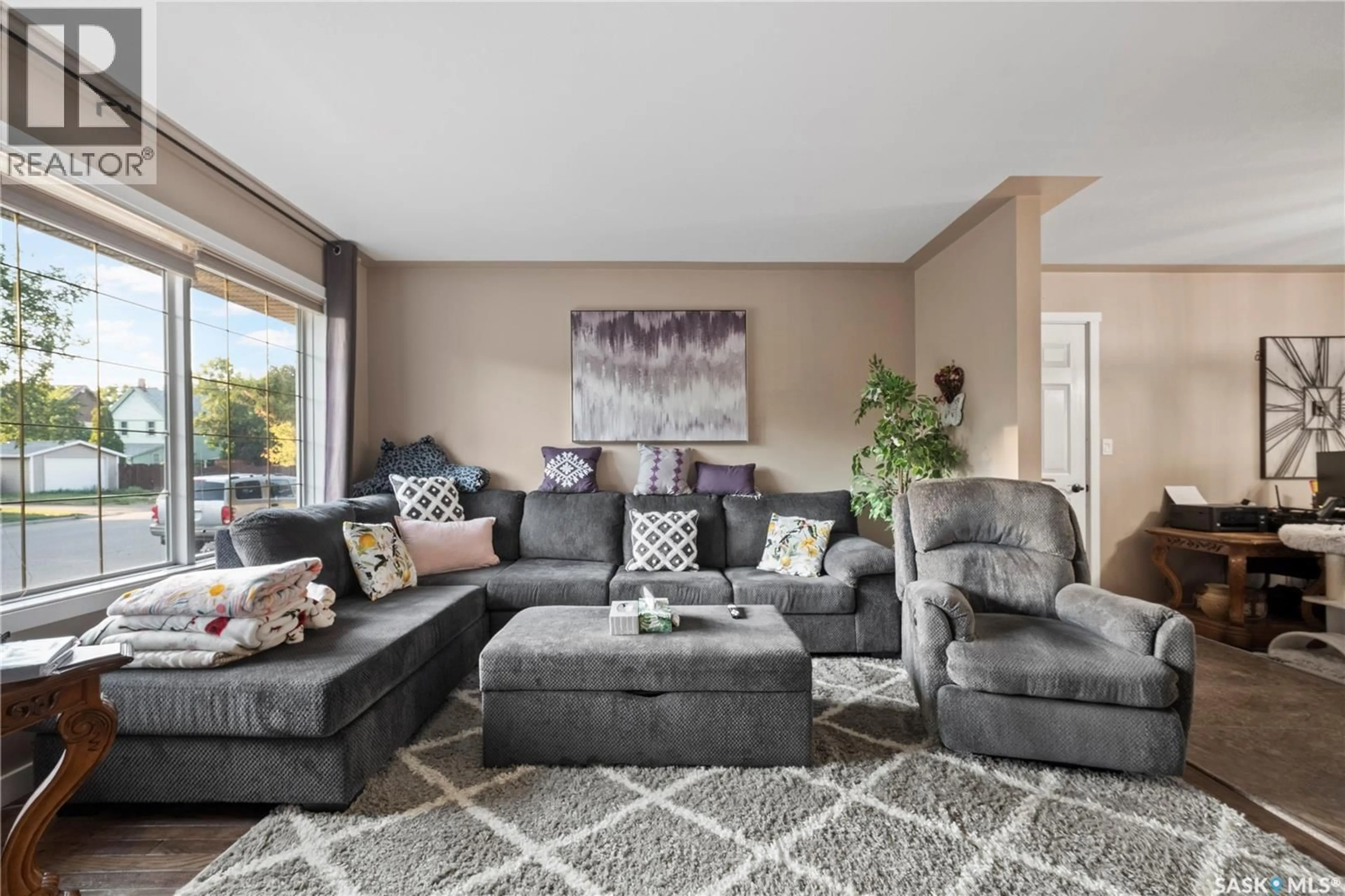 Living room with furniture, carpet floor for 405 4TH AVENUE, Moose Jaw Saskatchewan S6H8B8