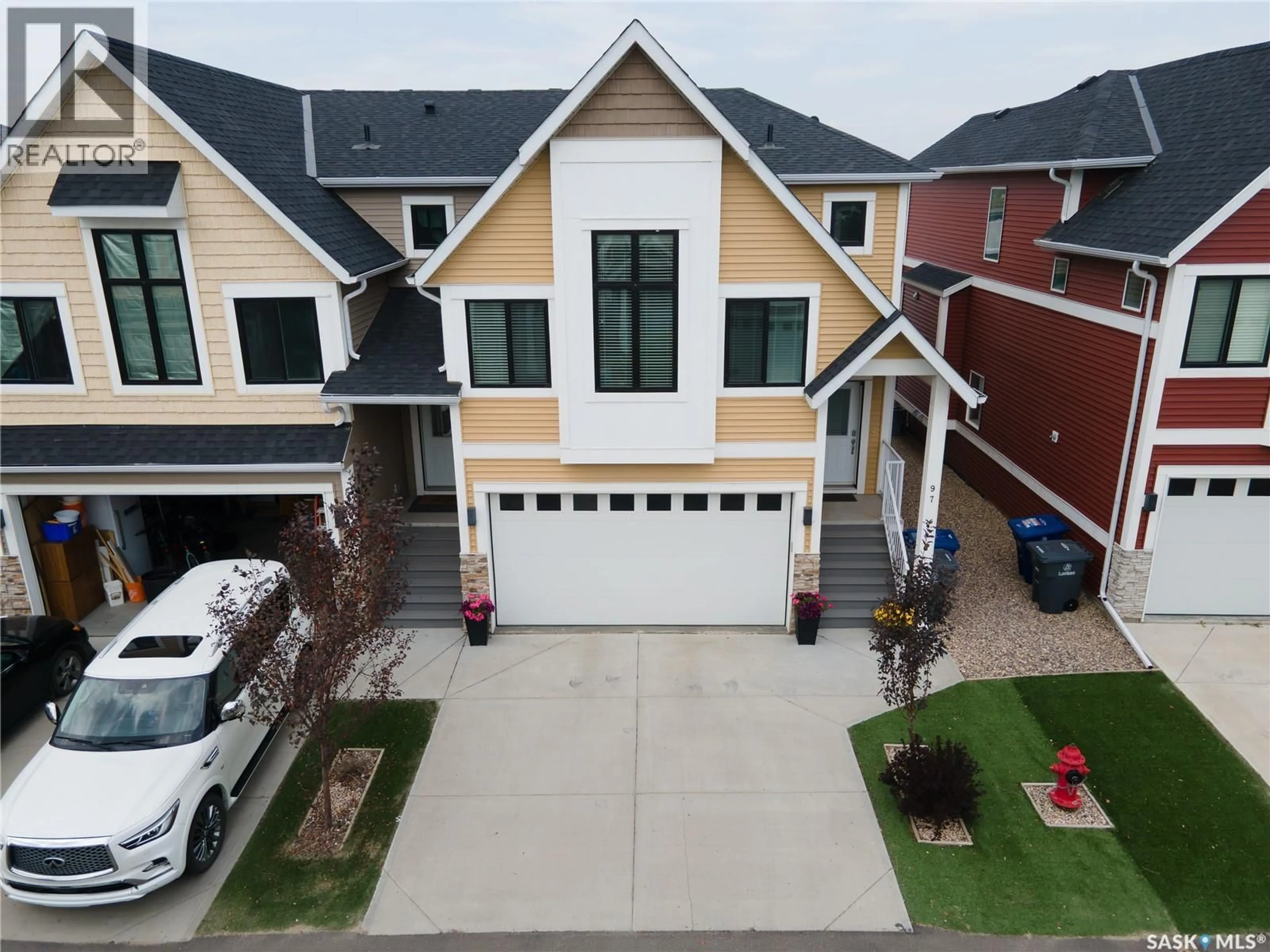 A pic from outside/outdoor area/front of a property/back of a property/a pic from drone, street for 900 - 97 ST ANDREWS LANE, Warman Saskatchewan S0K4S4