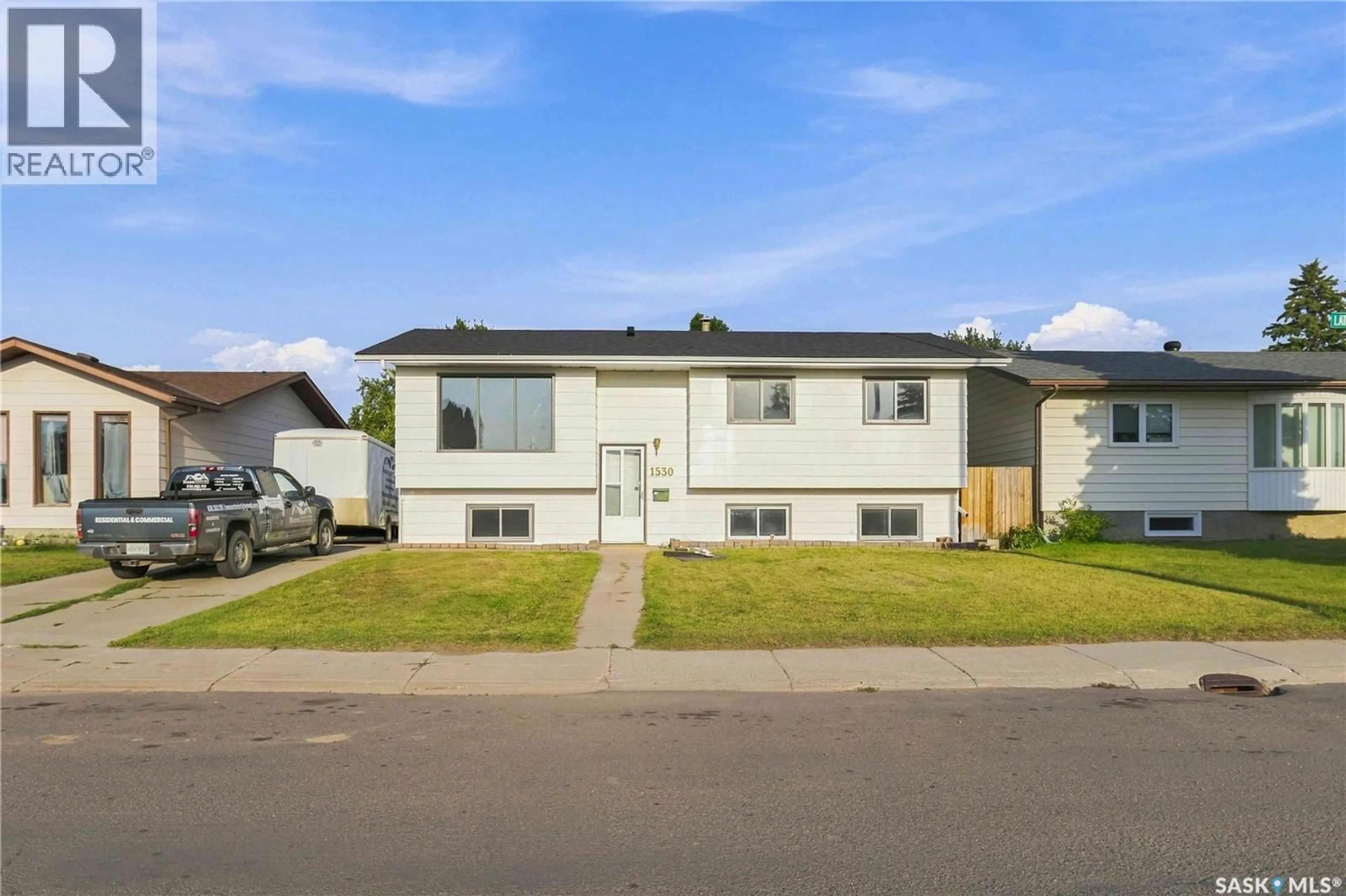 Home with vinyl exterior material, street for 1530 LATRACE ROAD, Saskatoon Saskatchewan S7L6M2