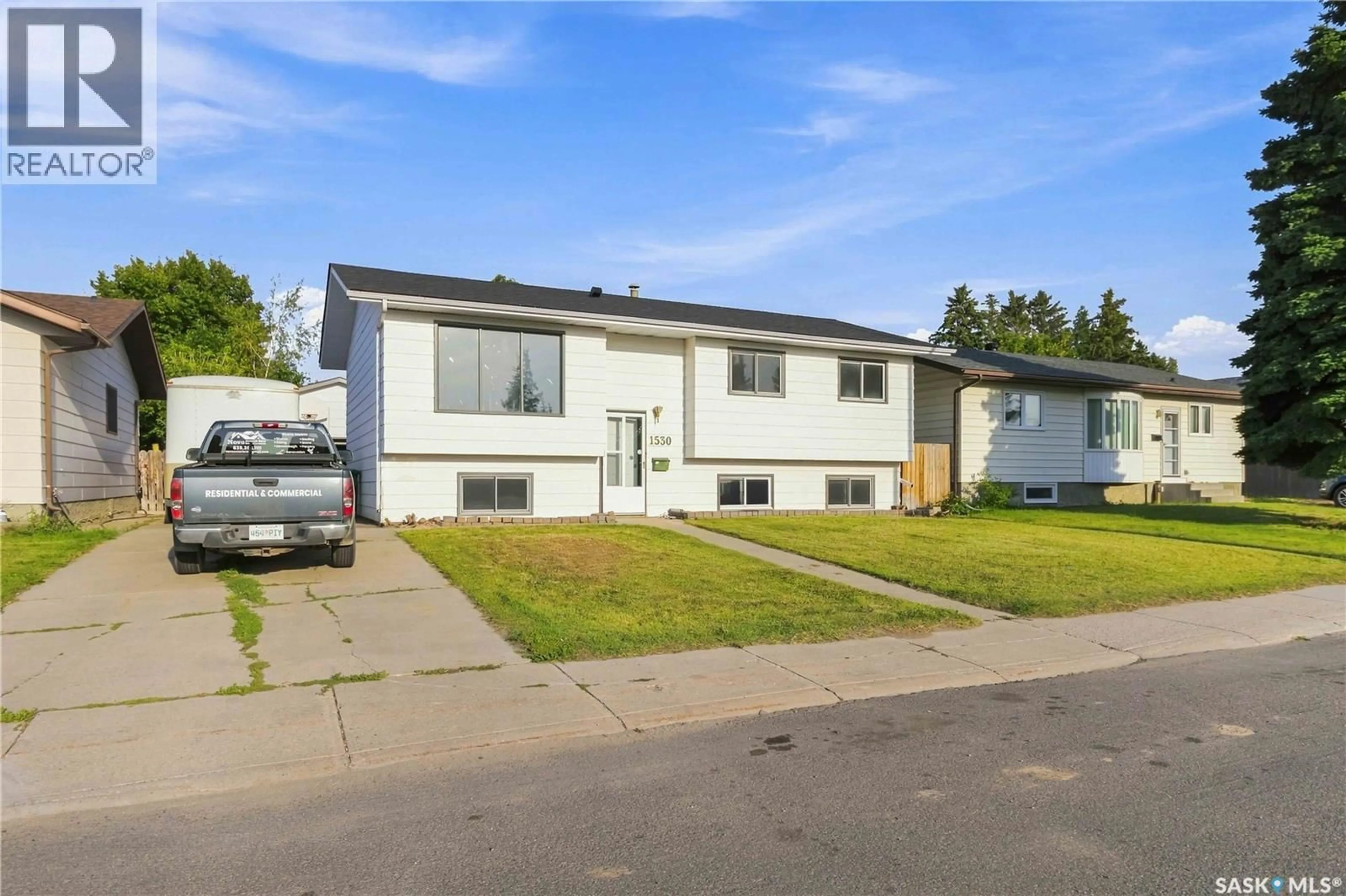 Home with vinyl exterior material, street for 1530 LATRACE ROAD, Saskatoon Saskatchewan S7L6M2