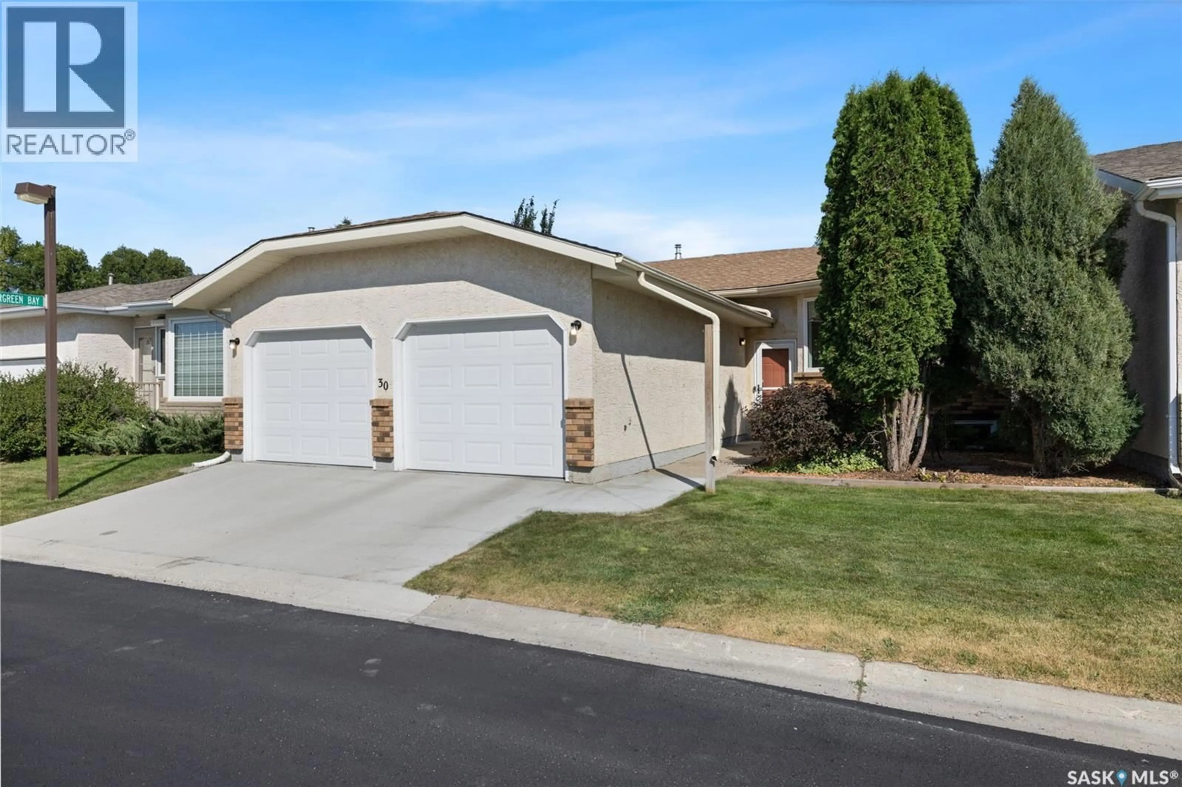 Home with vinyl exterior material, street for 30 GREENSBORO DRIVE, Regina Saskatchewan S4S7G1