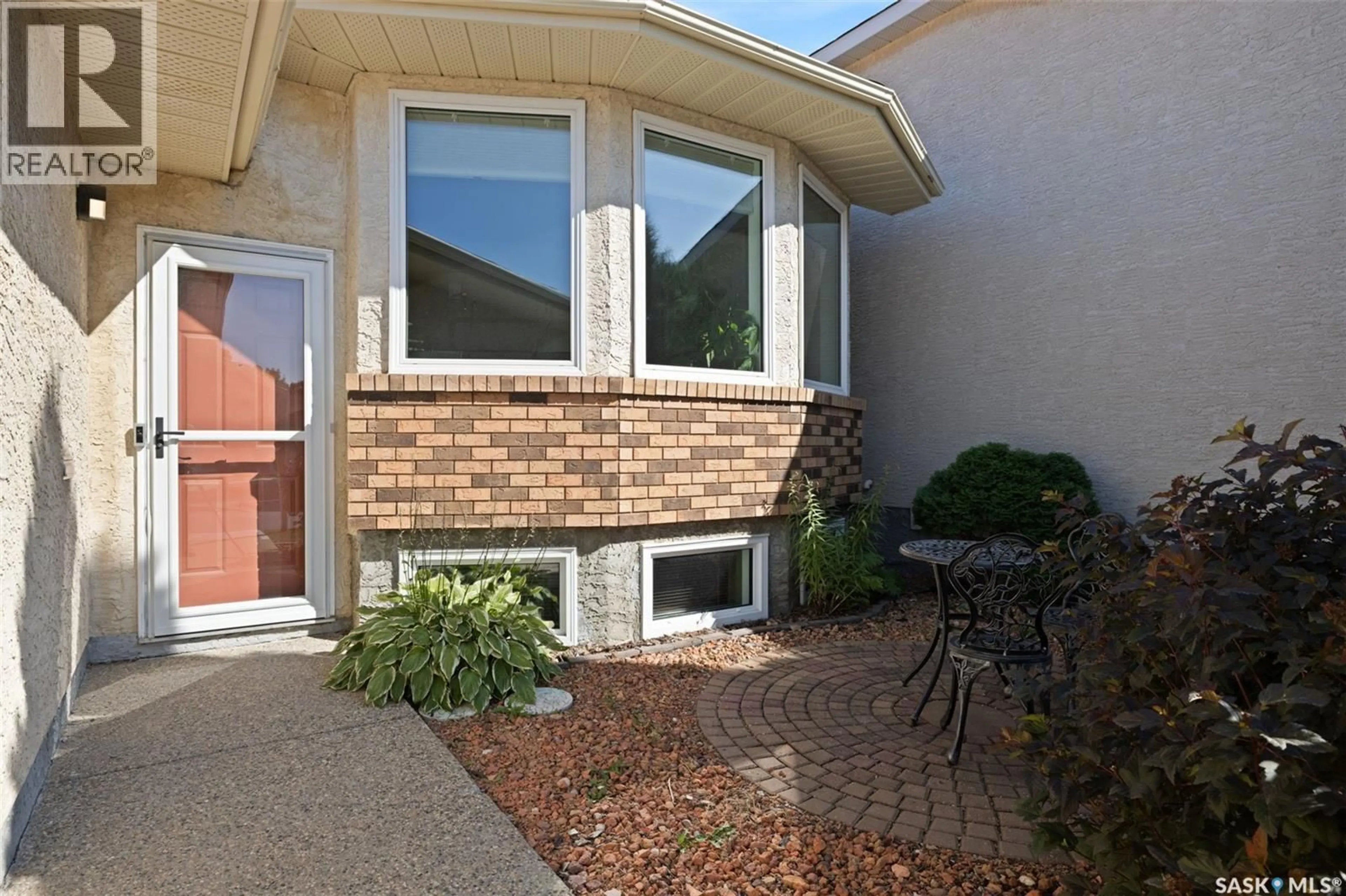 Home with vinyl exterior material, street for 30 GREENSBORO DRIVE, Regina Saskatchewan S4S7G1