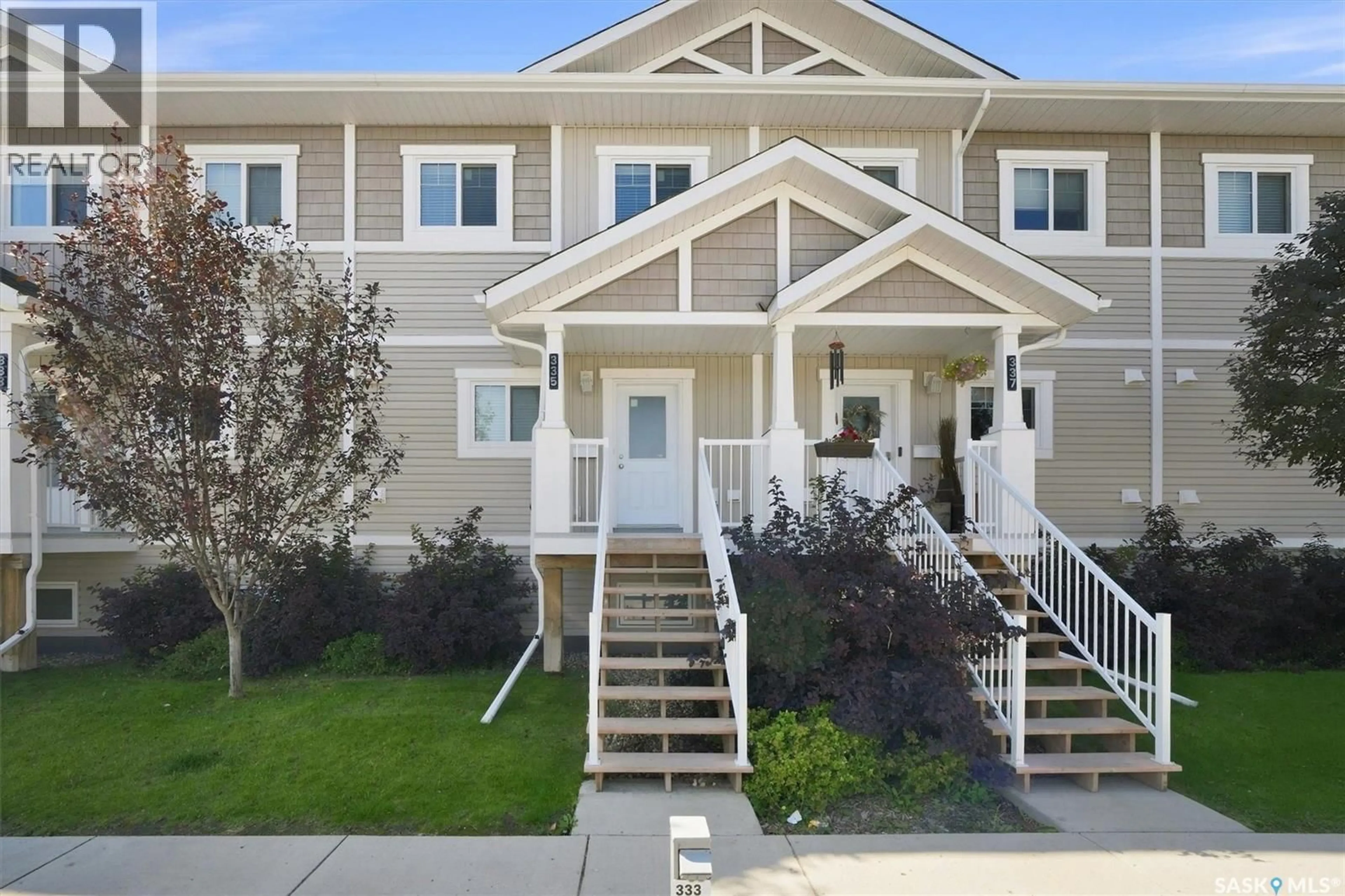 Home with vinyl exterior material, street for 522 - 335 CORNISH ROAD, Saskatoon Saskatchewan S7T0Z4