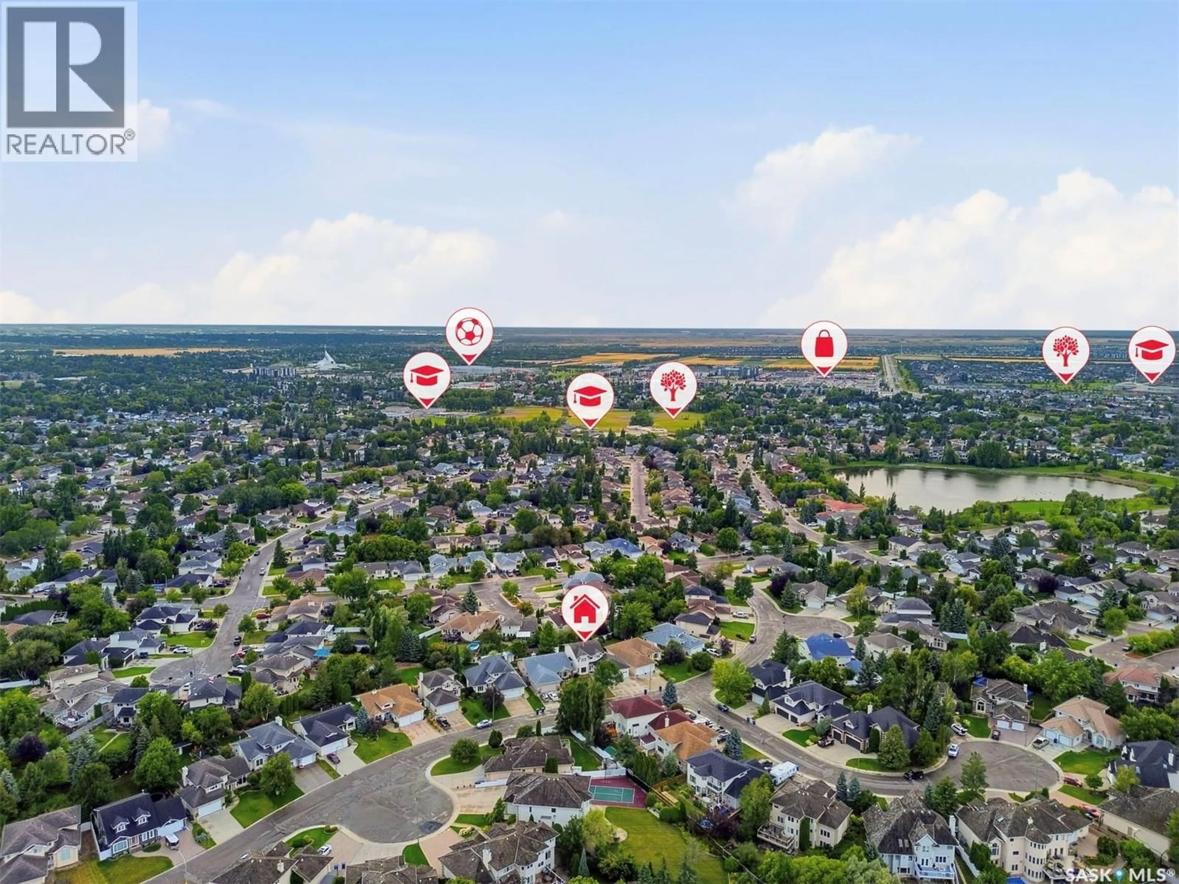 A pic from outside/outdoor area/front of a property/back of a property/a pic from drone, water/lake/river/ocean view for 310 CHOTEM CRESCENT, Saskatoon Saskatchewan S7N4M3