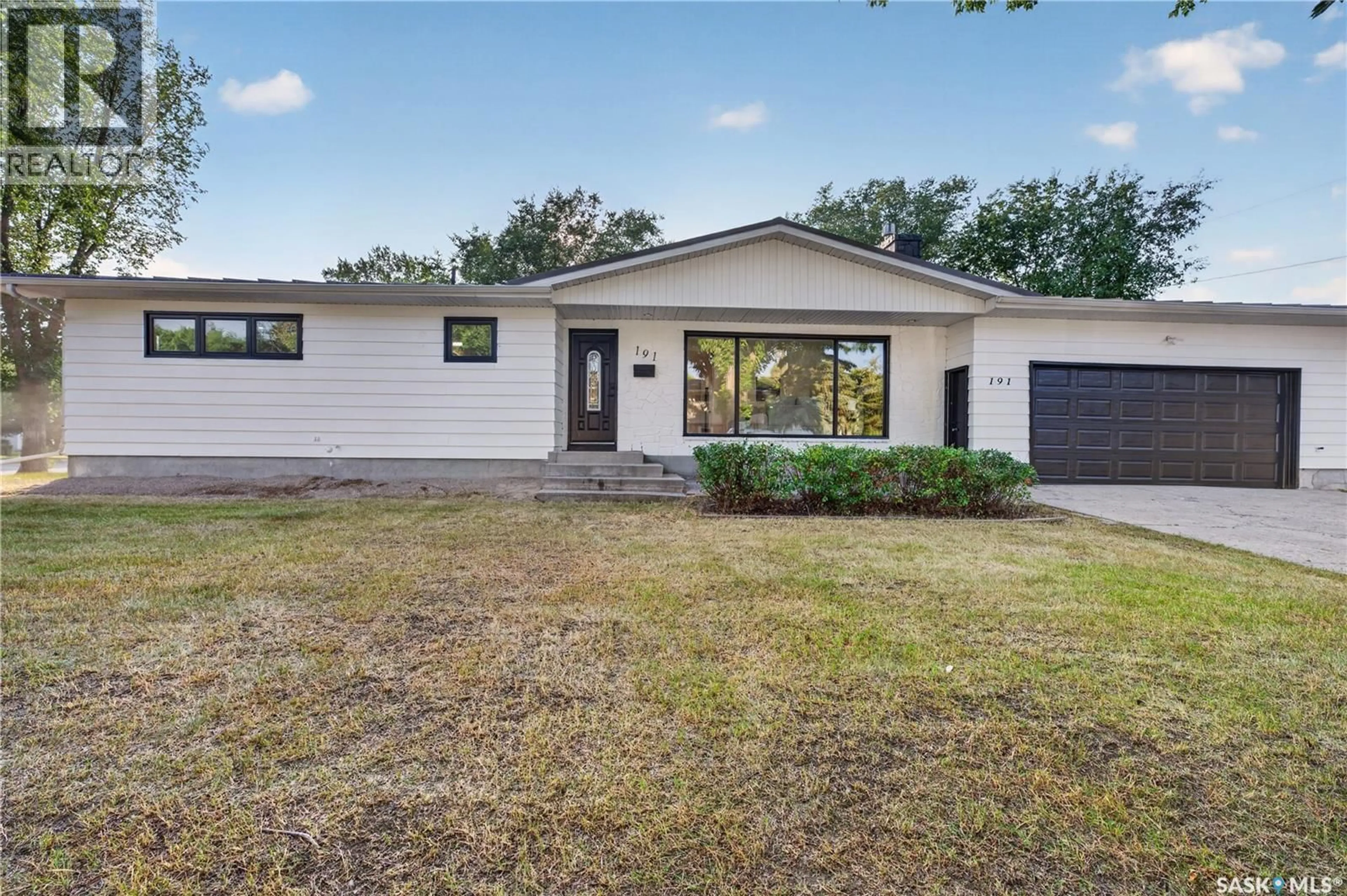 Home with vinyl exterior material, street for 191 PROCTER PLACE, Regina Saskatchewan S4S4G2