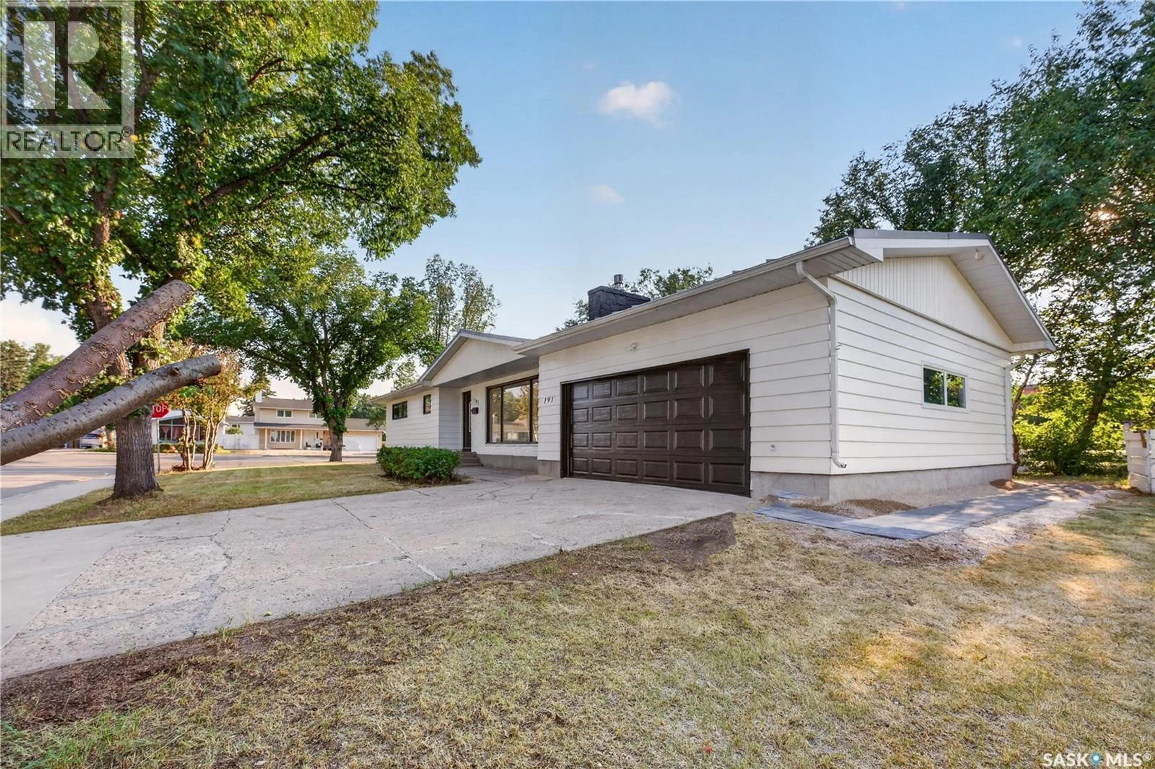 Home with vinyl exterior material, street for 191 PROCTER PLACE, Regina Saskatchewan S4S4G2